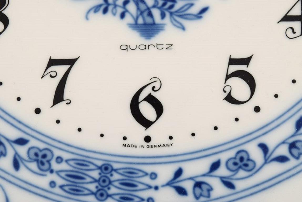 Junghans porcelain wall clock. Meissen Blue Onion style. Germany, 1970s. 1