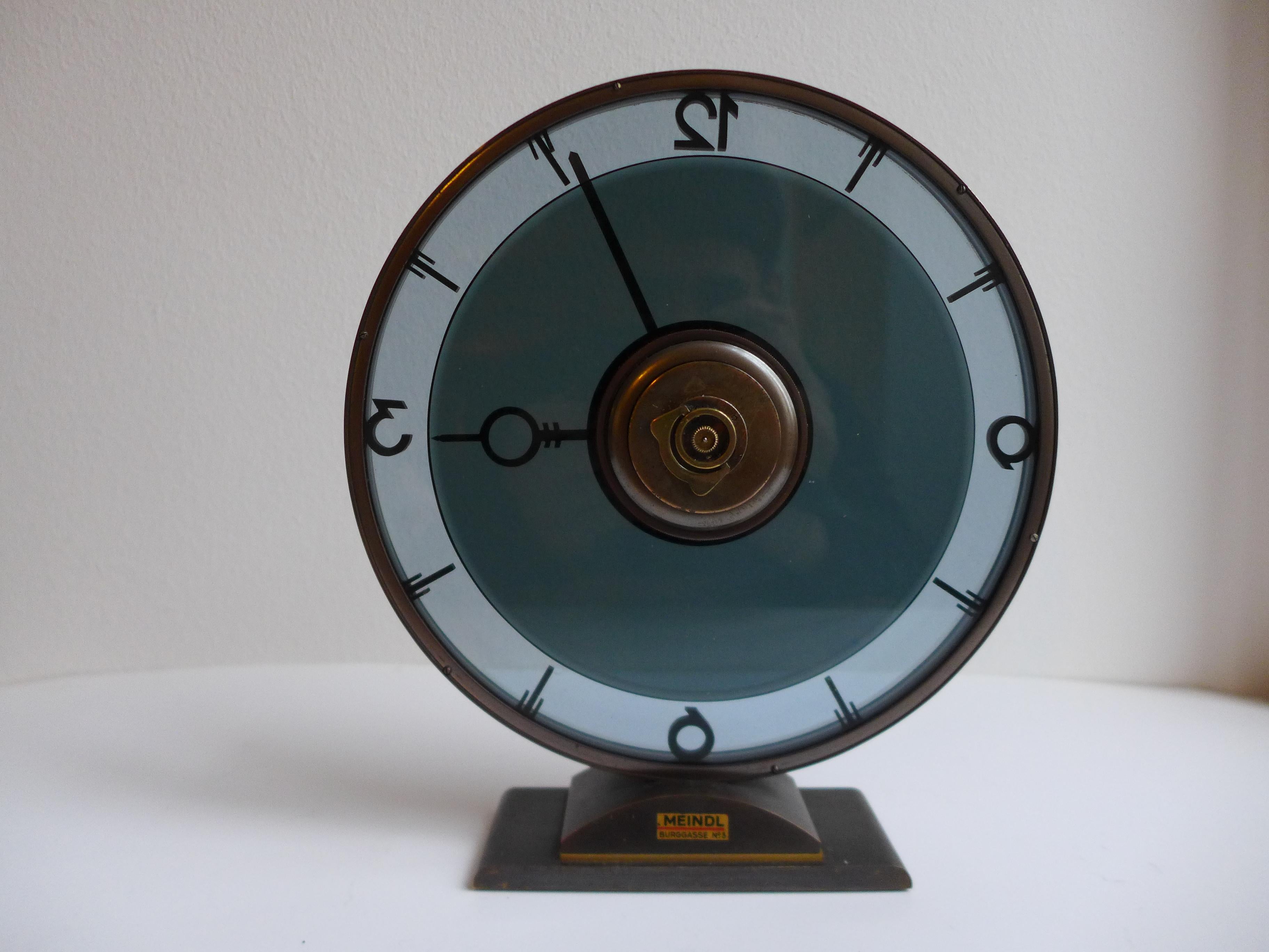 Wonderful Junghans table clock designed by Heinrich Moller, 1930. Crafted in solid brass with a beautifully aged patina, this piece showcases the refined geometric clarity characteristic of Moller’s early modernist designs. A timeless collectible