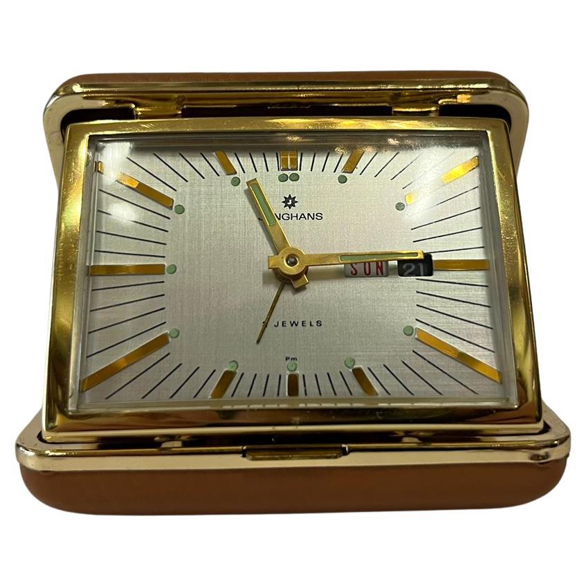 Vintage travel alarm clock by Junghans, 1950, good original condition, original packaging included.