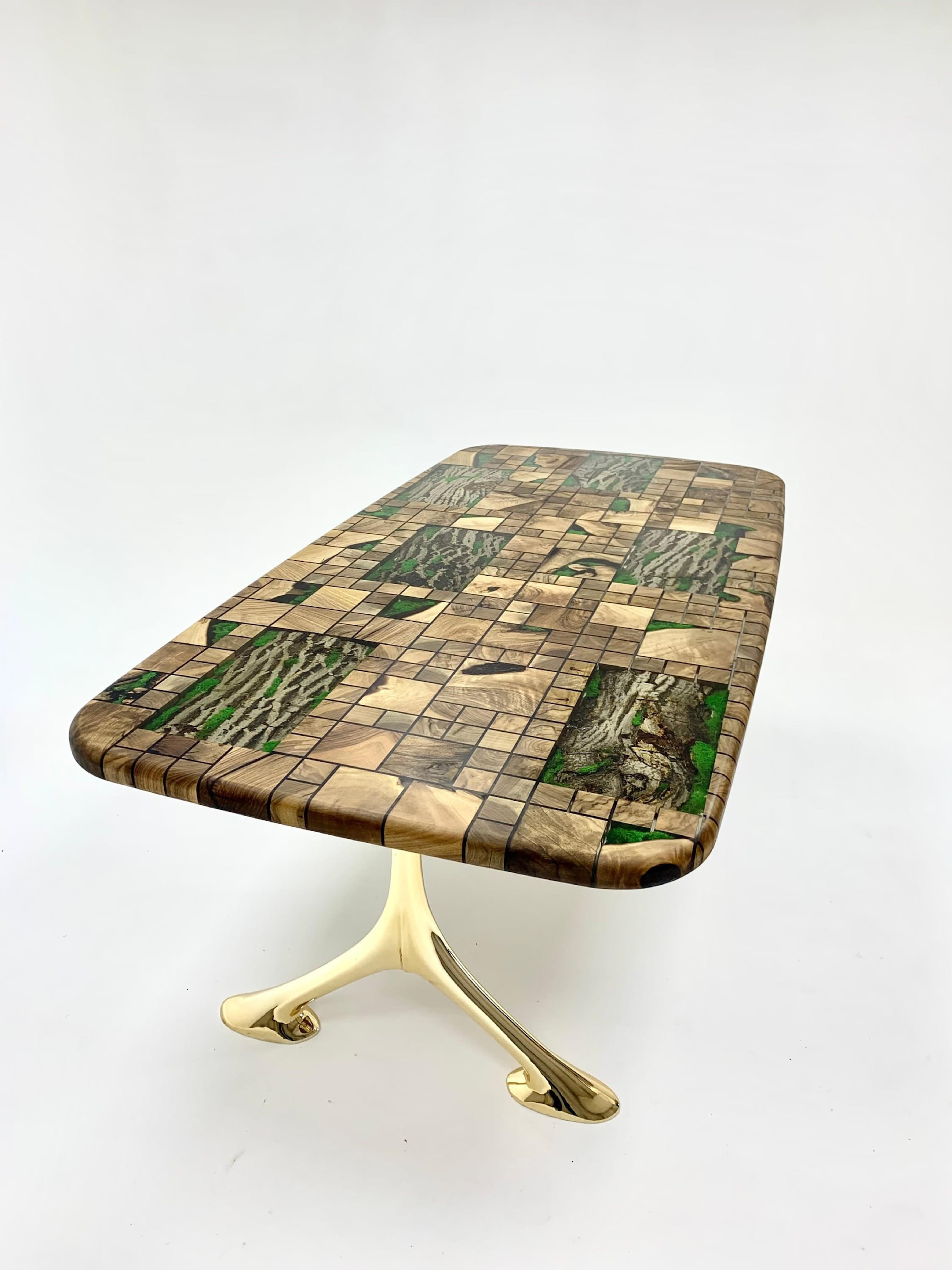Forest Design Custom Clear Epoxy Resin Dining & Conference Room Table 

This table is made of 5 different pieces of wood. The grains and texture of the woods describe what a forest looks like.
It can be used as a dining table or as a conference
