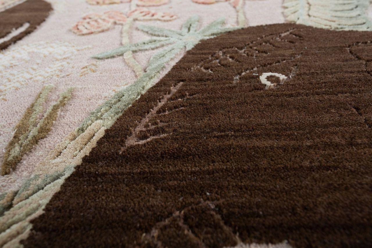 Imagine the rhythmic beat of distant drums and the rustle of palm fronds as you are transported to a land where elephants roam amidst lush greenery. Embark on such a journey of exotic allure for your interior with this masterpiece from our Inde Rose