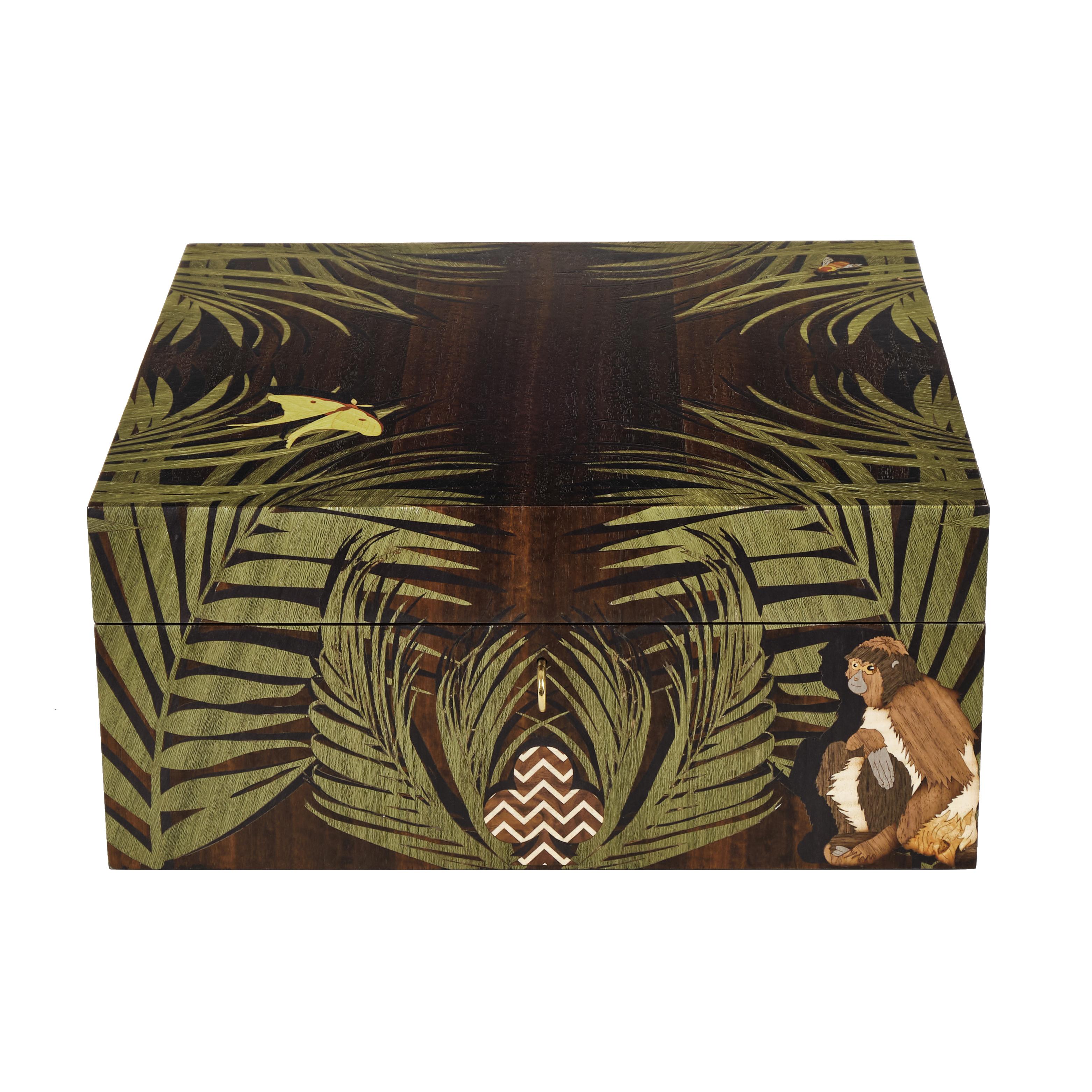 Wildly luxurious, Alexandra Llewellyn’s Jungle Marquetry Poker Set brings the rainforest to the card table. Inlaid with over 1,000 pieces of sustainable wood marquetry and crafted from Fumed Eucalyptus, the box hides four secret compartments,
