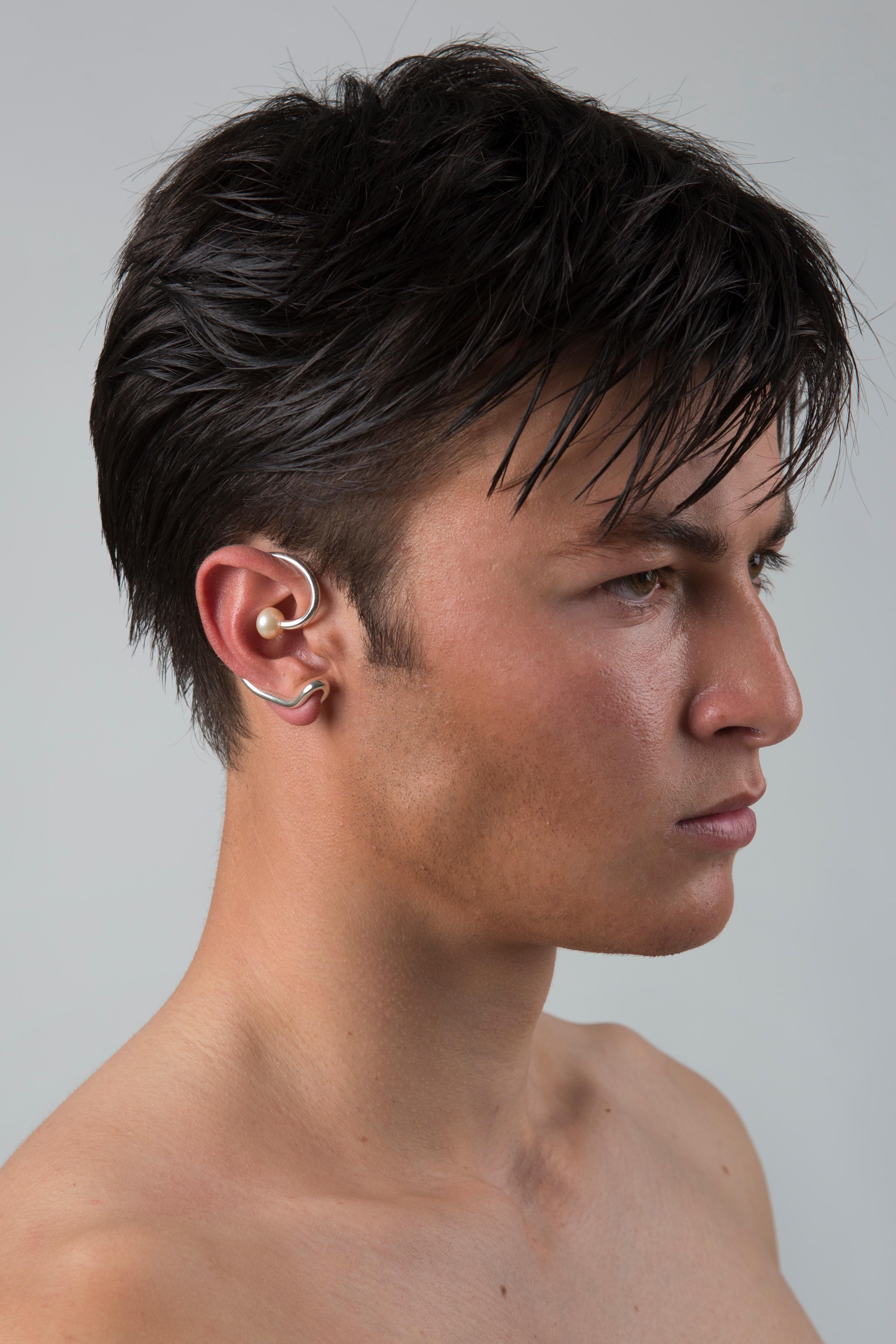 Playable, ergonomically designed ear cuff. The wire is flexible. User can adjust it by playing in hand.