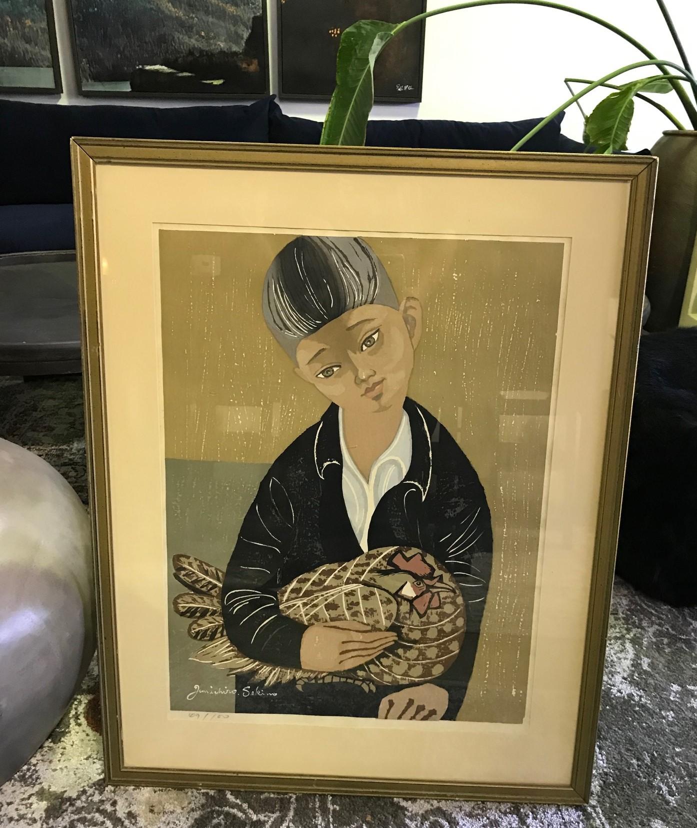 A wonderful portrait of a young boy (likely the artist's son) posing with his pet rooster by master Japanese artist or printer Junichiro Sekino.

The print is signed in ink within the image and numbered (69/100) by the artist. The image is a very