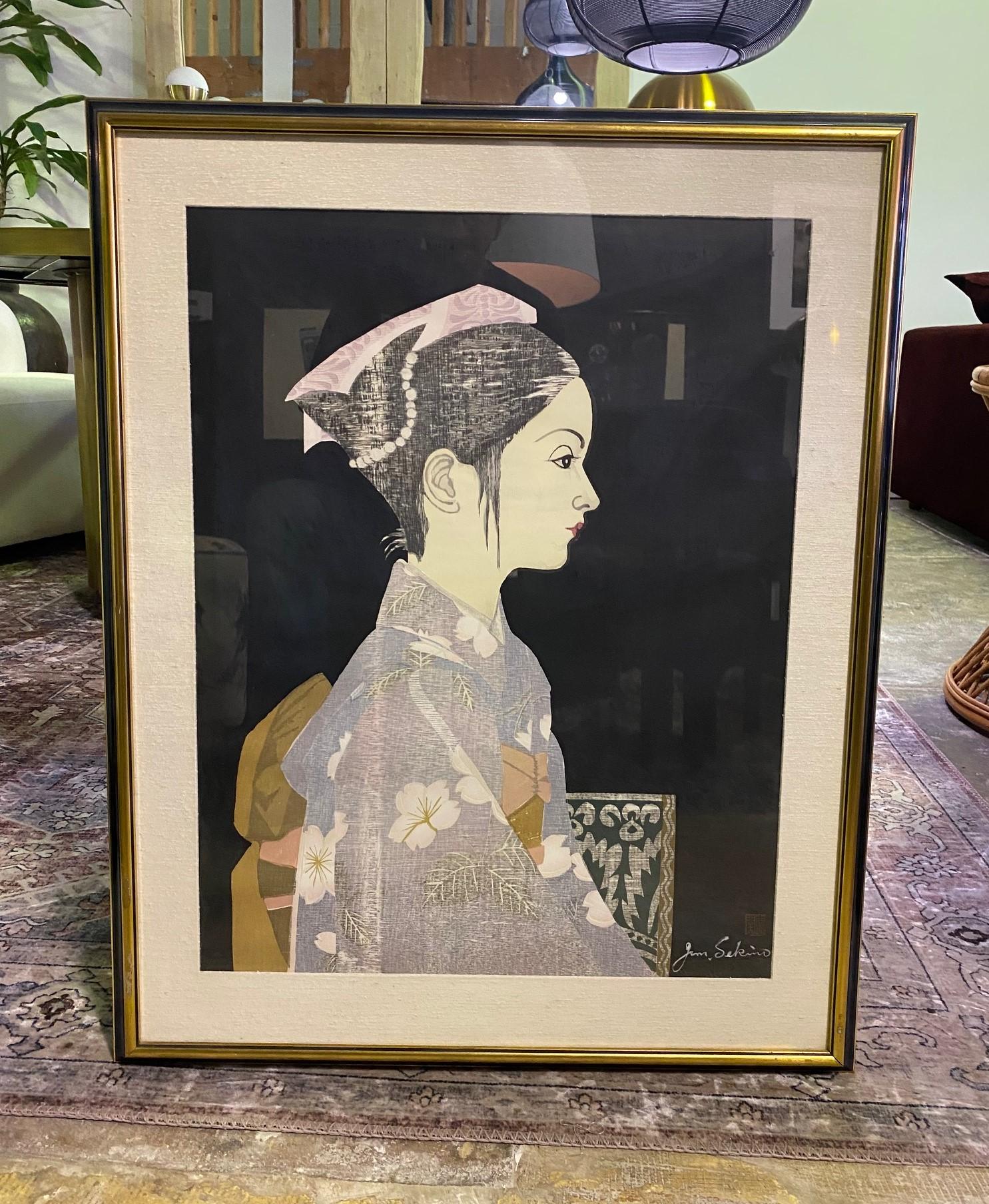 A wonderfully composed and colored, limited edition woodblock print by famed Japanese artist Junichiro Sekino.

This print, which is titled 