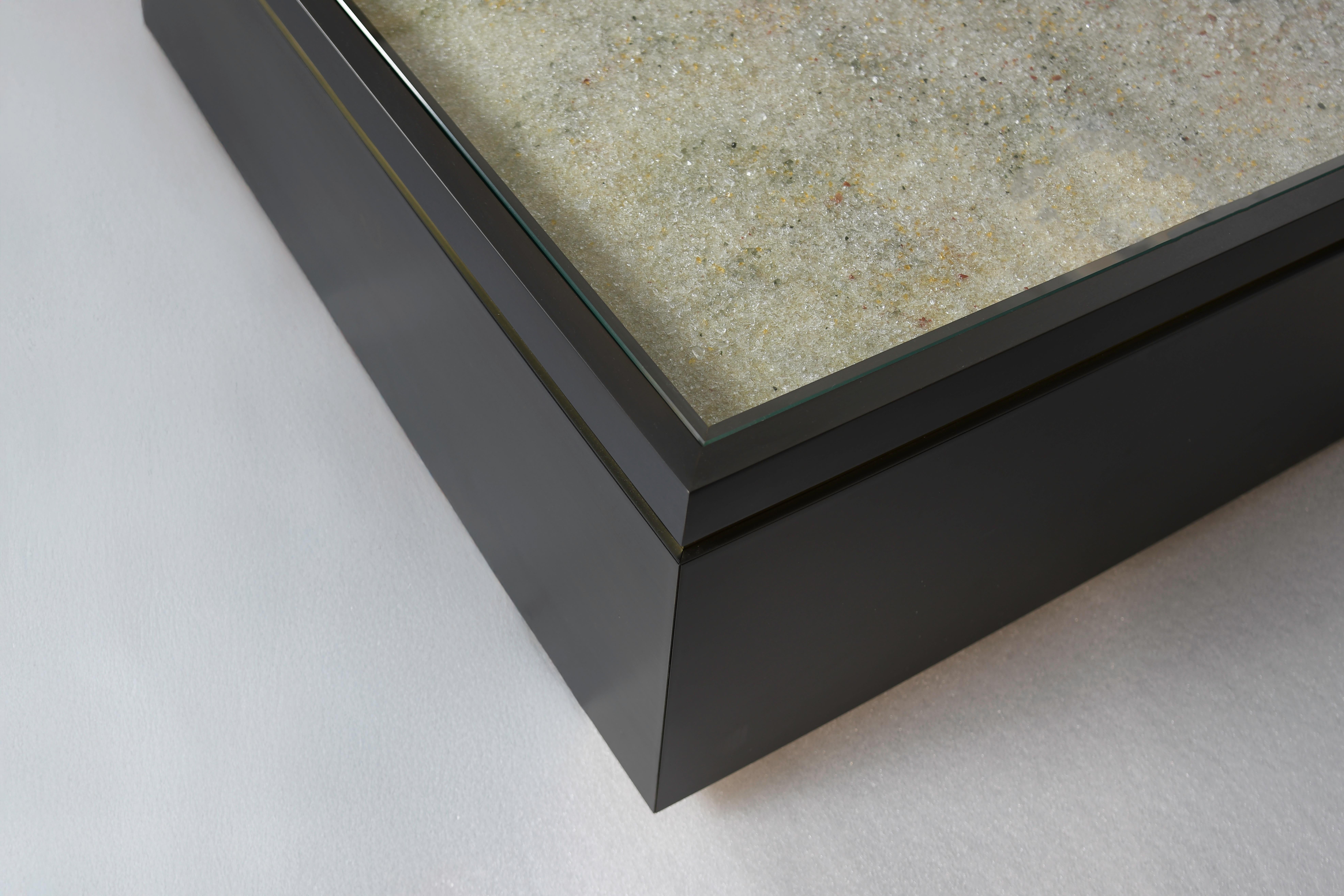 Mesa de centro con tapa de cristal 