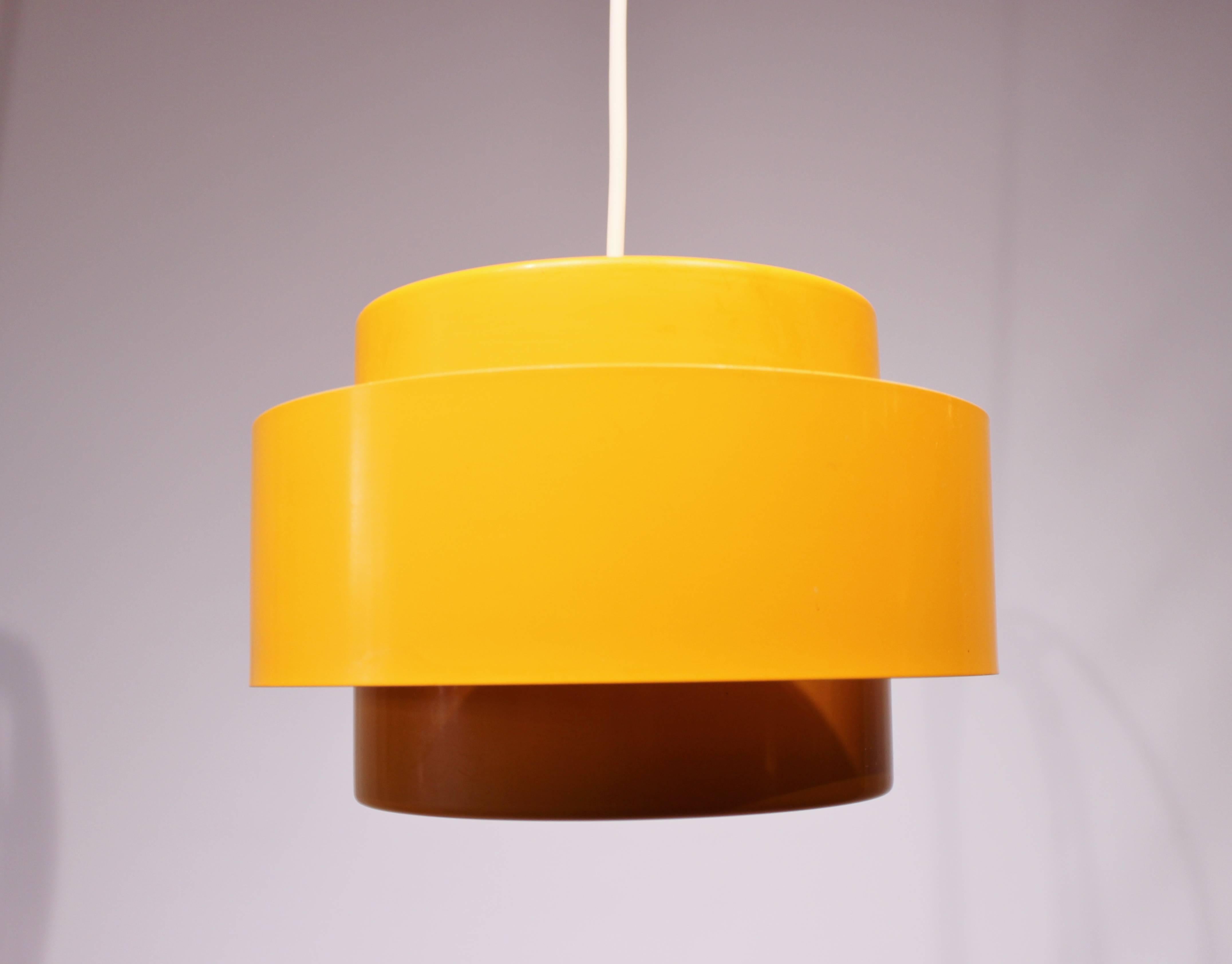 Juno pendant with dark yellow metal shades designed by Jo Hammerborg for Fog and Mørup, from the 1960s. The lamp is in great vintage condition.