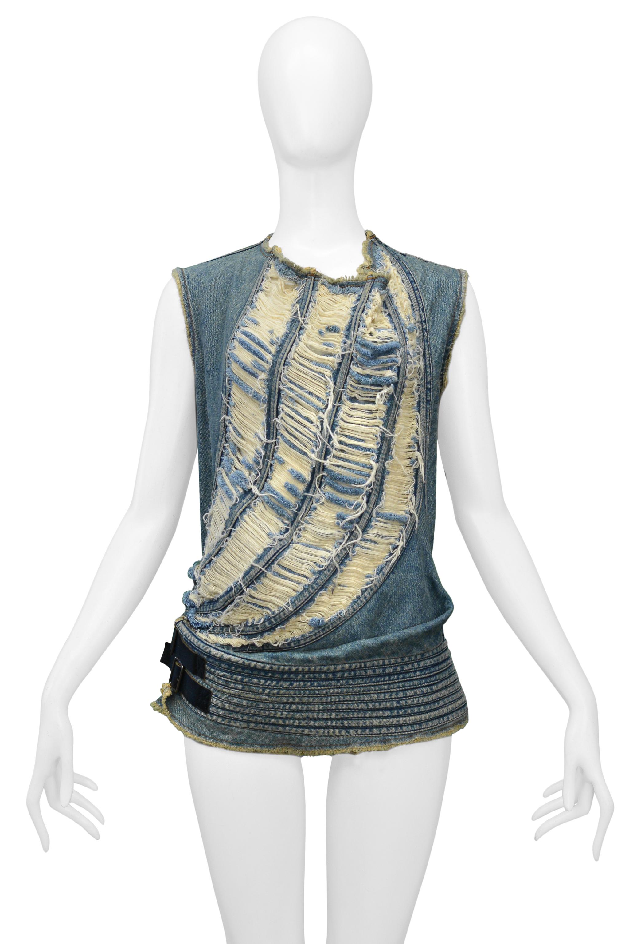 Resurrection Vintage is excited to offer a vintage Junya Watanabe for Comme des Garcons blue denim sleeveless top with a shredded front panel and attached waist belt with two buckles and leather straps. 

Junya Watanabe
Size: Medium
100%