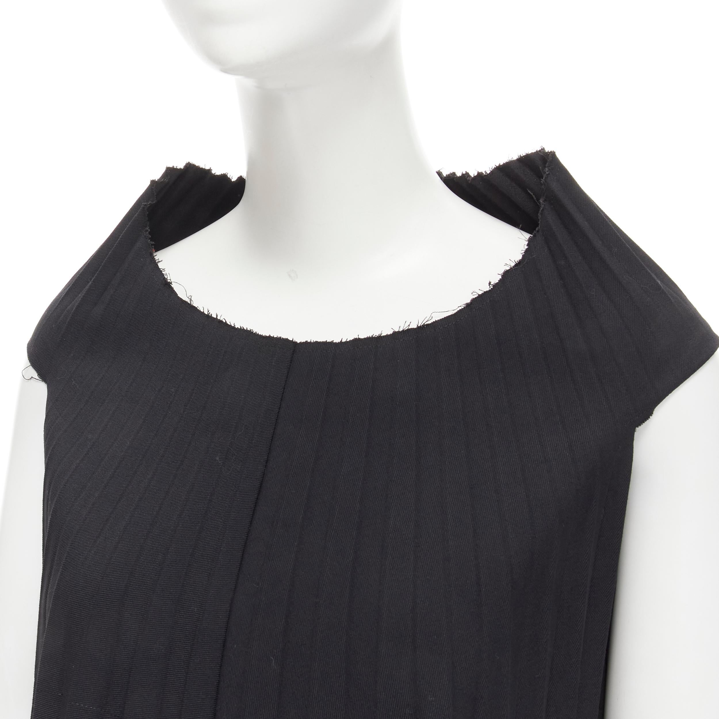 JUNYA WATANABE 1998 black Accordion pleated raw edge deconstructed dress S 
Reference: CRTI/A00498 
Brand: Junya Watanabe 
Collection: 1998 
Material: Cotton 
Color: Black 
Pattern: Solid 
Extra Detail: Rounded shoulder collar. Raw seam hem. Frayed