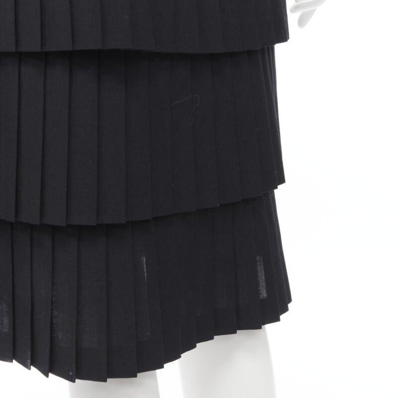JUNYA WATANABE 1998 black pleated tiered hem pencil skirt S
Reference: CRTI/A00310
Brand: Junya Watanabe
Designer: Junya Watanabe
Collection: 1998
Material: Polyester, Wool
Color: Black
Pattern: Solid
Closure: Zip
Extra Details: Button zip side
