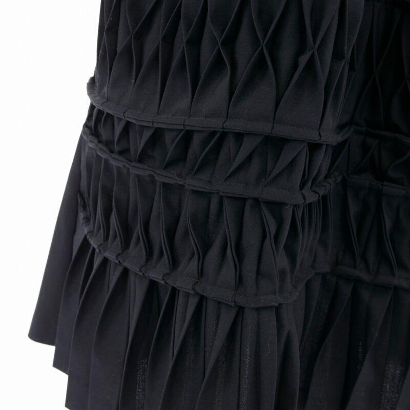JUNYA WATANABE 1998 black wool blend origami pleated front wrap tie skirt M
Reference: CRTI/A00139
Brand: Junya Watanabe
Designer: Junya Watanabe
Collection: AD1998
Material: Wool
Color: Black
Pattern: Solid
Extra Details: 
FROM THE AD1998