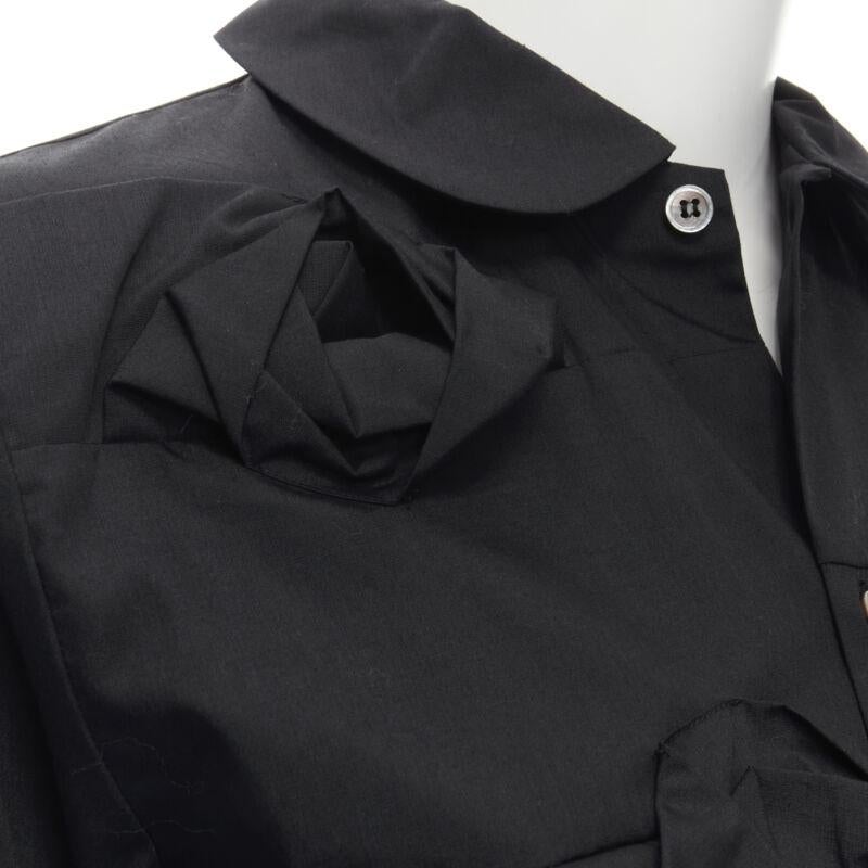 JUNYA WATANABE 1999 black cotton rose bud round collar long sleeve shirt M
Reference: CRTI/A00483
Brand: Junya Watanabe
Designer: Junya Watanabe
Collection: 1999
Material: Cotton
Color: Black
Pattern: Solid
Closure: Button
Extra Details: Round