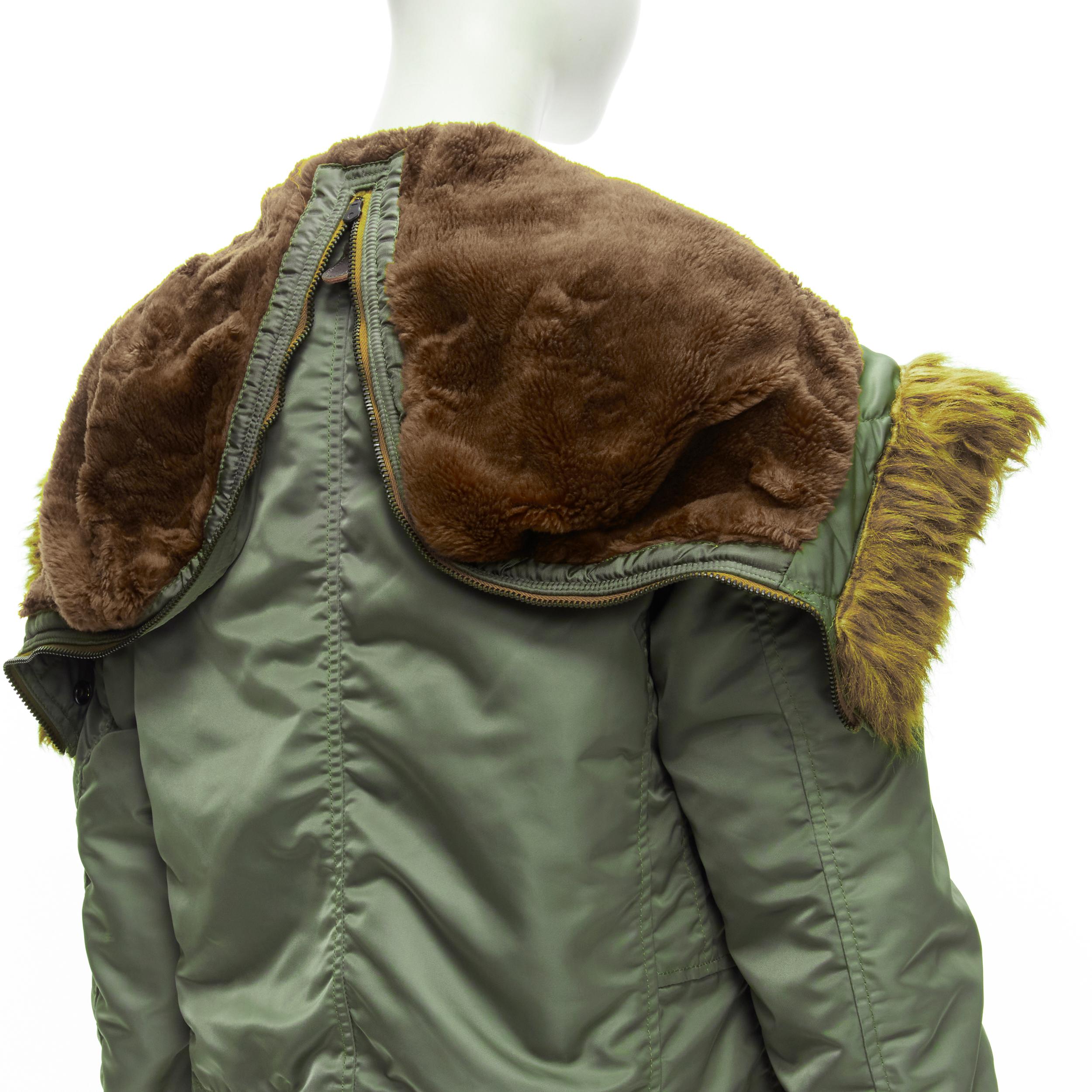 JUNYA WATANABE 2006 brown faux fur hood green padded safari army coat XS
Reference: TGAS/C01680
Brand: Junya Watanabe
Designer: Junya Watanabe
Collection: 2006
Material: Nylon, Polyester
Color: Green, Brown
Pattern: Solid
Closure: Zip
Lining: Green