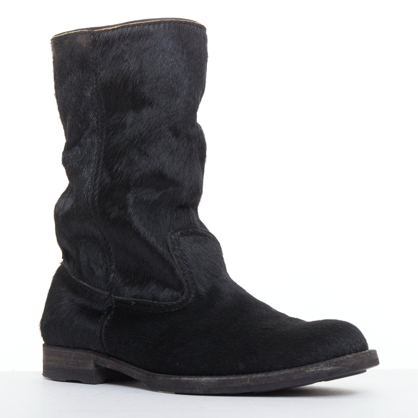 JUNYA WATANABE 2017 botas de combate de punta redonda con paneles de pelo de becerro negro S EU37
Referencia: TGAS/F00161
Marca: Junya Watanabe
Colección: AW 2017
Material: Pelo de becerro
Color: Negro
Patrón: Sólido
Cierre: Slip On
Forro: Piel