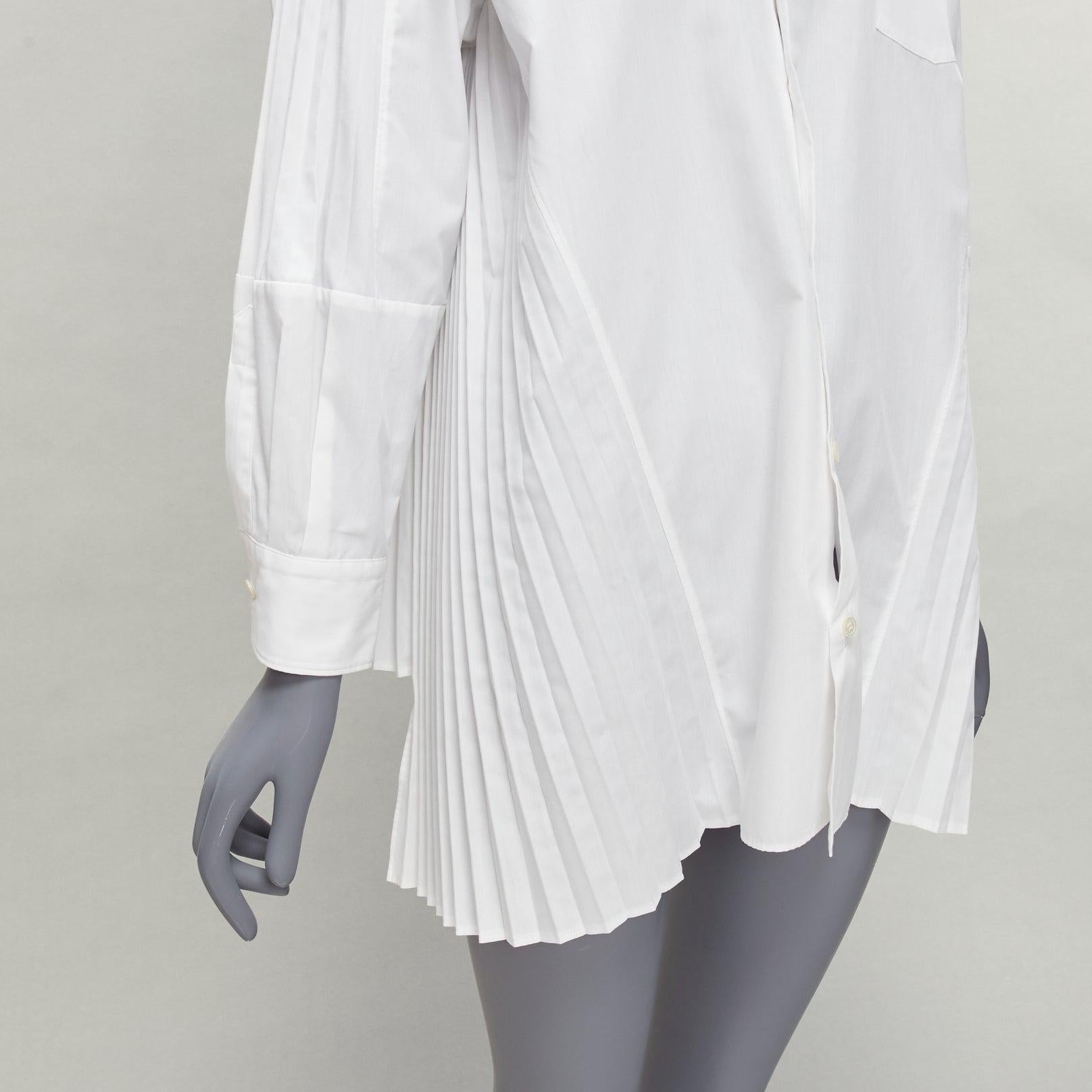 JUNYA WATANABE 2018 white accordion pleat side tunic shirt XS
Reference: LNKO/A02229
Brand: Junya Watanabe
Designer: Junya Watanabe
Collection: 2018
Material: Polyester, Cotton
Color: White
Pattern: Solid
Closure: Button
Extra Details: Accordion
