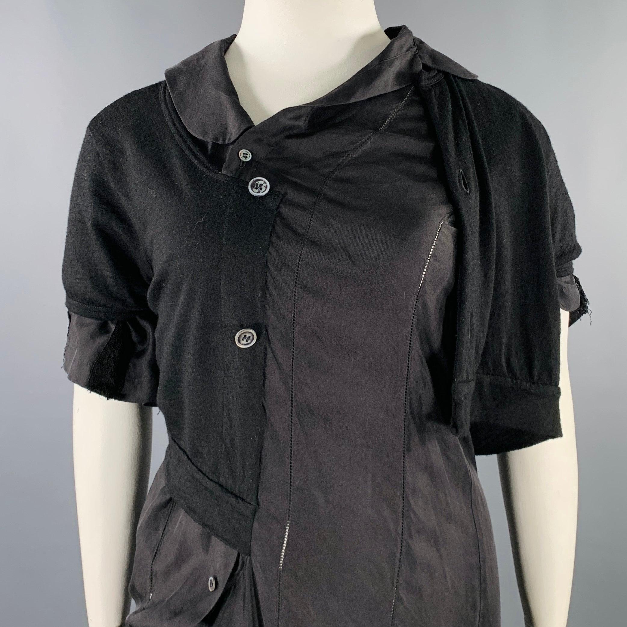 JUNYA WATANABE AW 2007 dress
in a black fabric featuring an asymmetrical faux shirt dress with knit cardigan outer layer, and button closure. Made in Japan.Excellent Pre-Owned Condition. 

Marked:   L 

Measurements: 
 
Shoulder: 20 inches Bust: 40