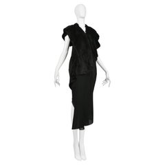 Junya Watanabe - Vestito nero con drappeggio e pelliccia sintetica