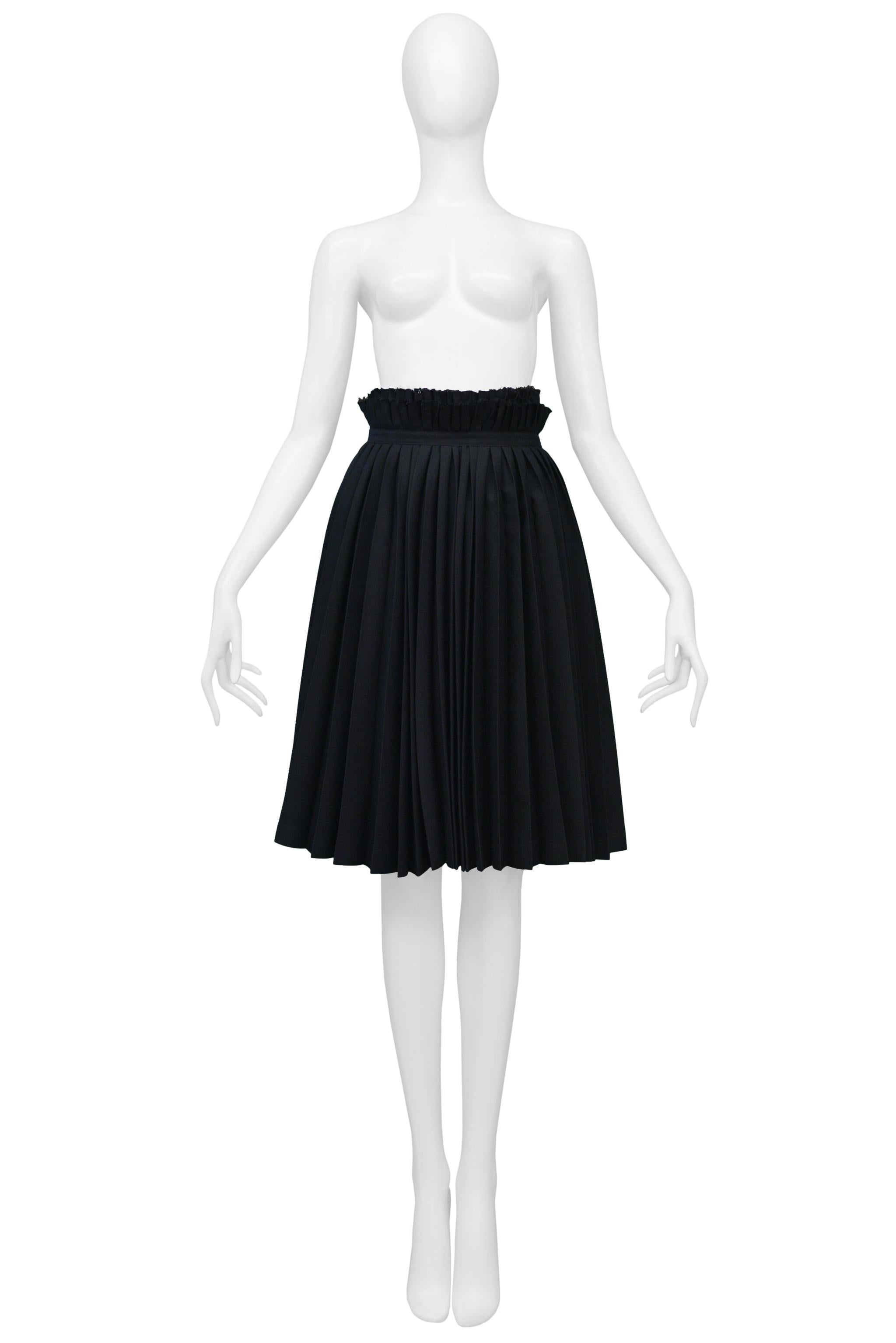 Resurrection Vintage is excited to offer a vintage Junya Watanabe for Comme des Garcons black wool pleated wrap skirt. 

Junya Watanabe
Size: Small
Fabric: Polyester and Wool
1998 Collection
Excellent Vintage Condition
Authenticity Guaranteed
