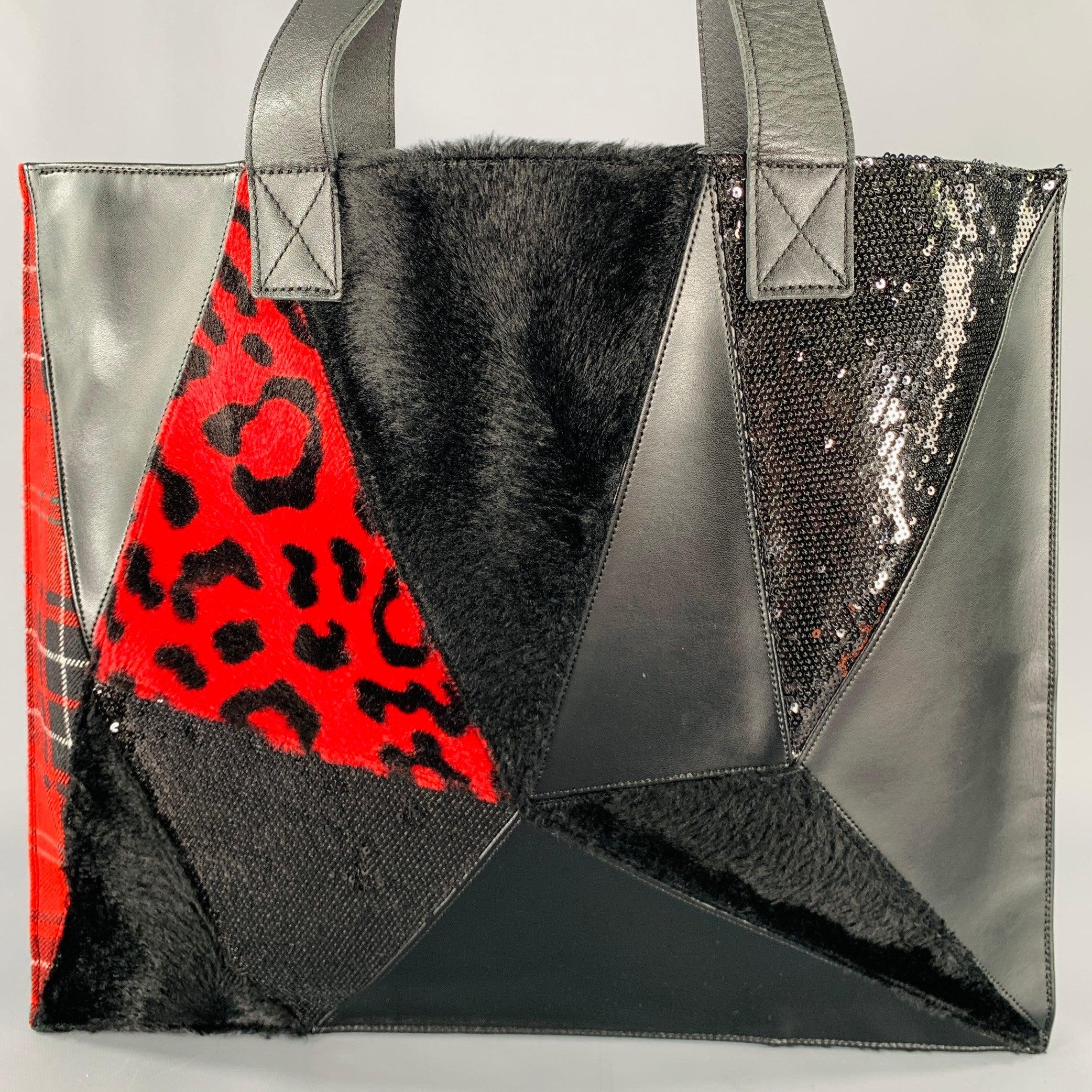 JUNYA WATANABE handbag
in a black and red faux leather fabric featuring a patchwork mixed materials design including sequins, faux fur, and plaid patches. Made in Japan.Excellent Pre-Owned Condition. 

Measurements: 
  Length: 16 inches Height: 13.5