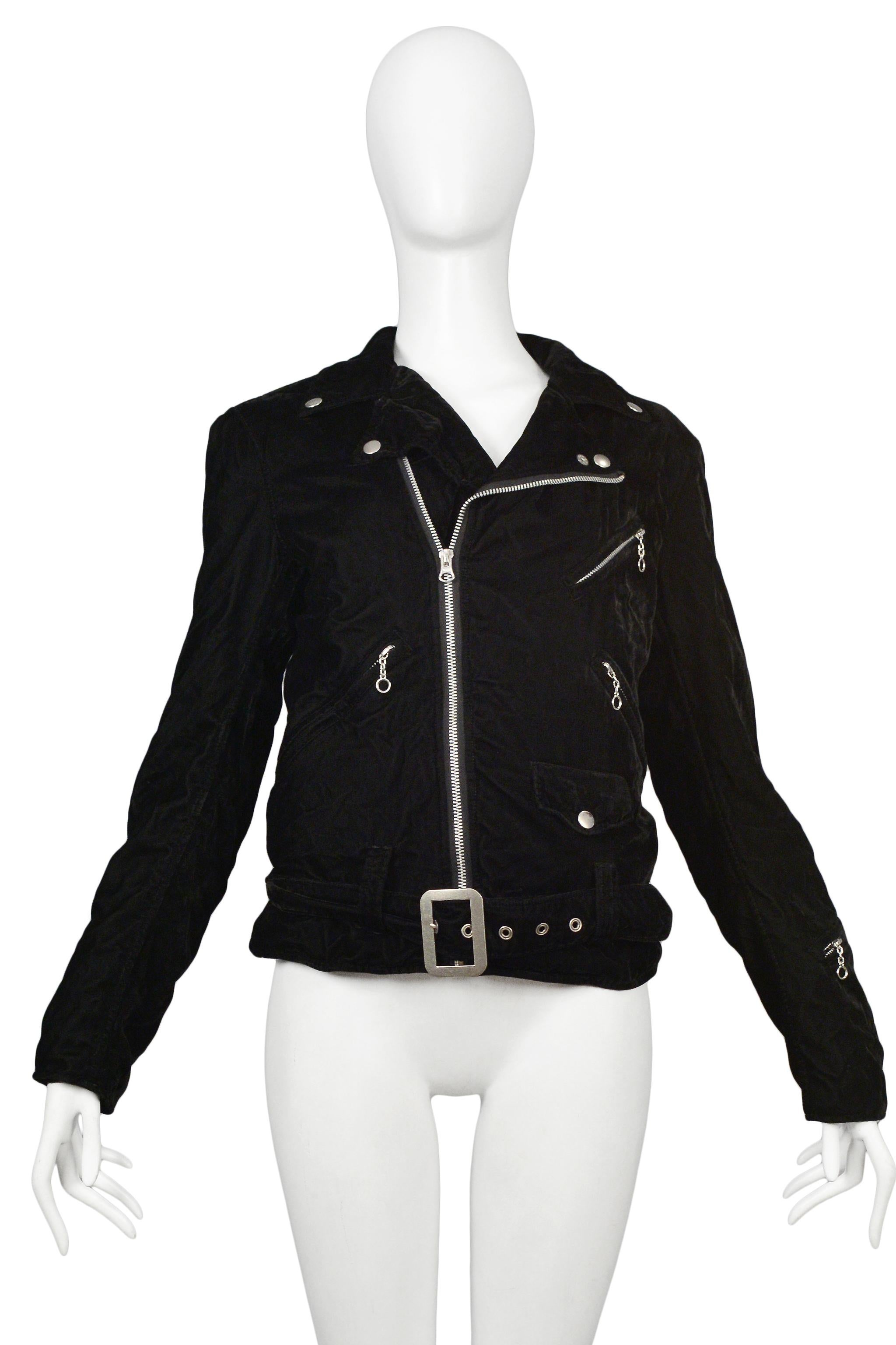 Resurrection Vintage is excited to offer a vintage Junya Watanabe for Comme des Garcons black velvet motorcycle jacket featuring classic moto details, side pockets, a snap pocket, sleeve zippers, silver-tone zippers, snaps, grommets, and belt