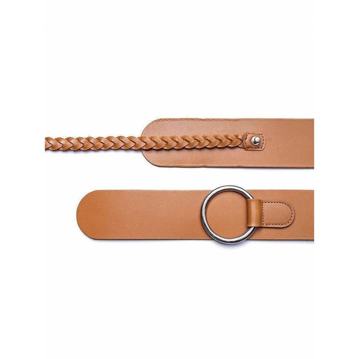 This wide leather belt is classic and versatile in tan with silver ring hardware and beautiful braided detail from vintage Junya Watanabe.
