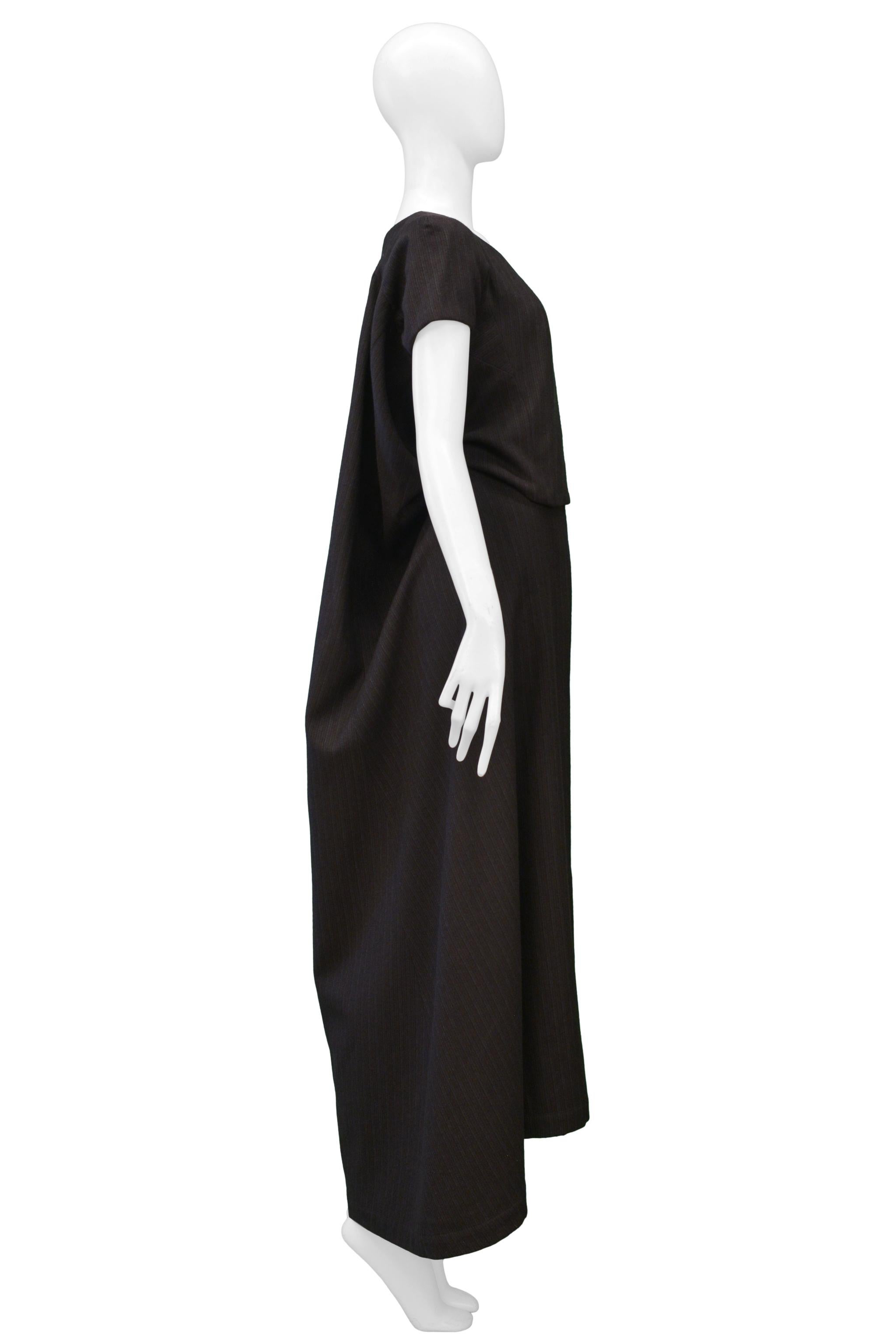 Resurrection Vintage is excited to offer a vintage Junya Watanabe for Comme des Garcons brown wool pinstripe maxi gown with giant back pleat and muslin trim lining. 

Junya Watanabe
Size: Small
Wool 
1996 Collection
Excellent Vintage