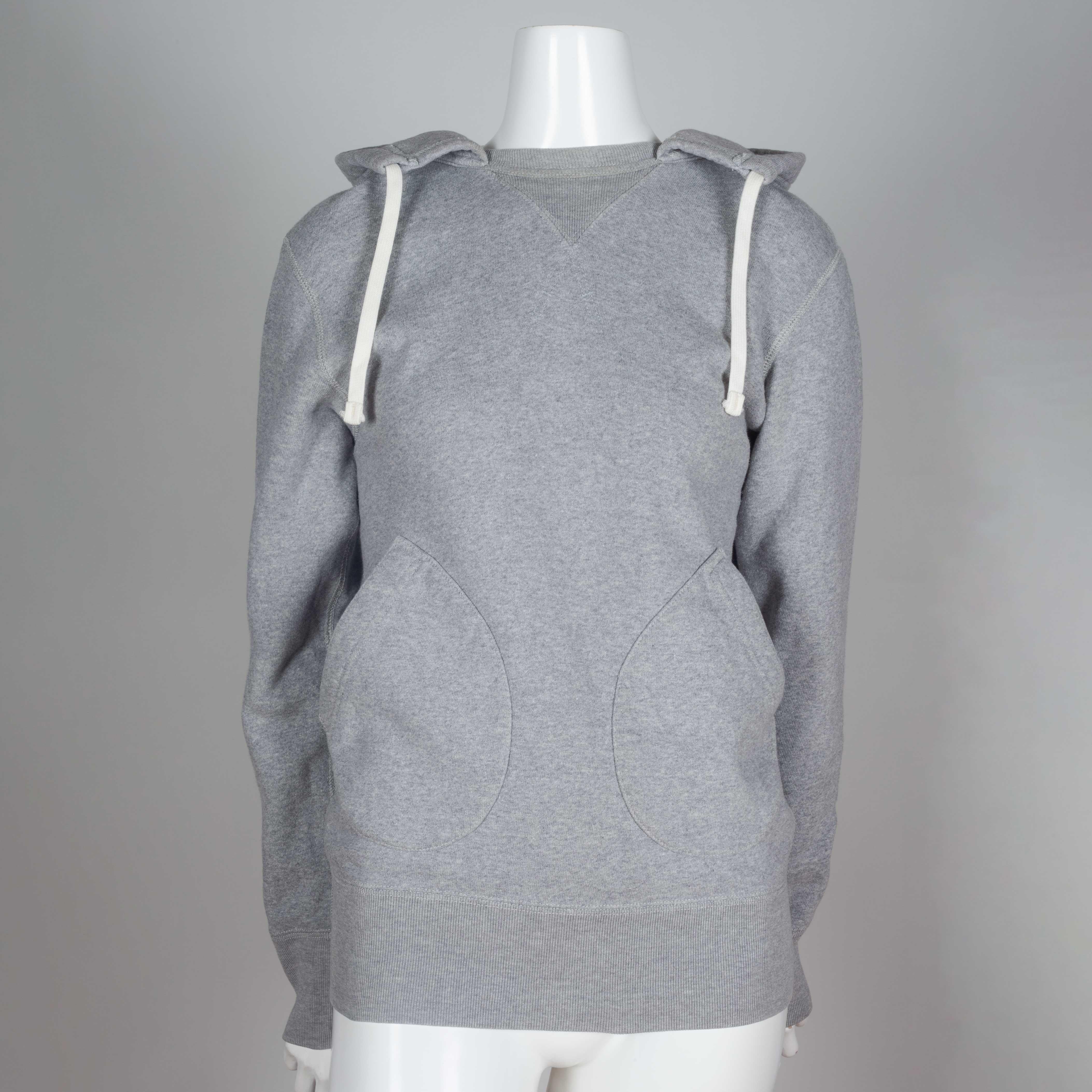 Gray hooded sweatshirt by eYe Junya Watanabe Man Comme des Garçons 2012. Draw string hood, exterior stitching and rounded pouch pockets in the front. Casual hoodie for chilling.

YEAR: 2012
MARKED SIZE: S
US WOMEN'S: S
US MEN'S: XS
FIT: