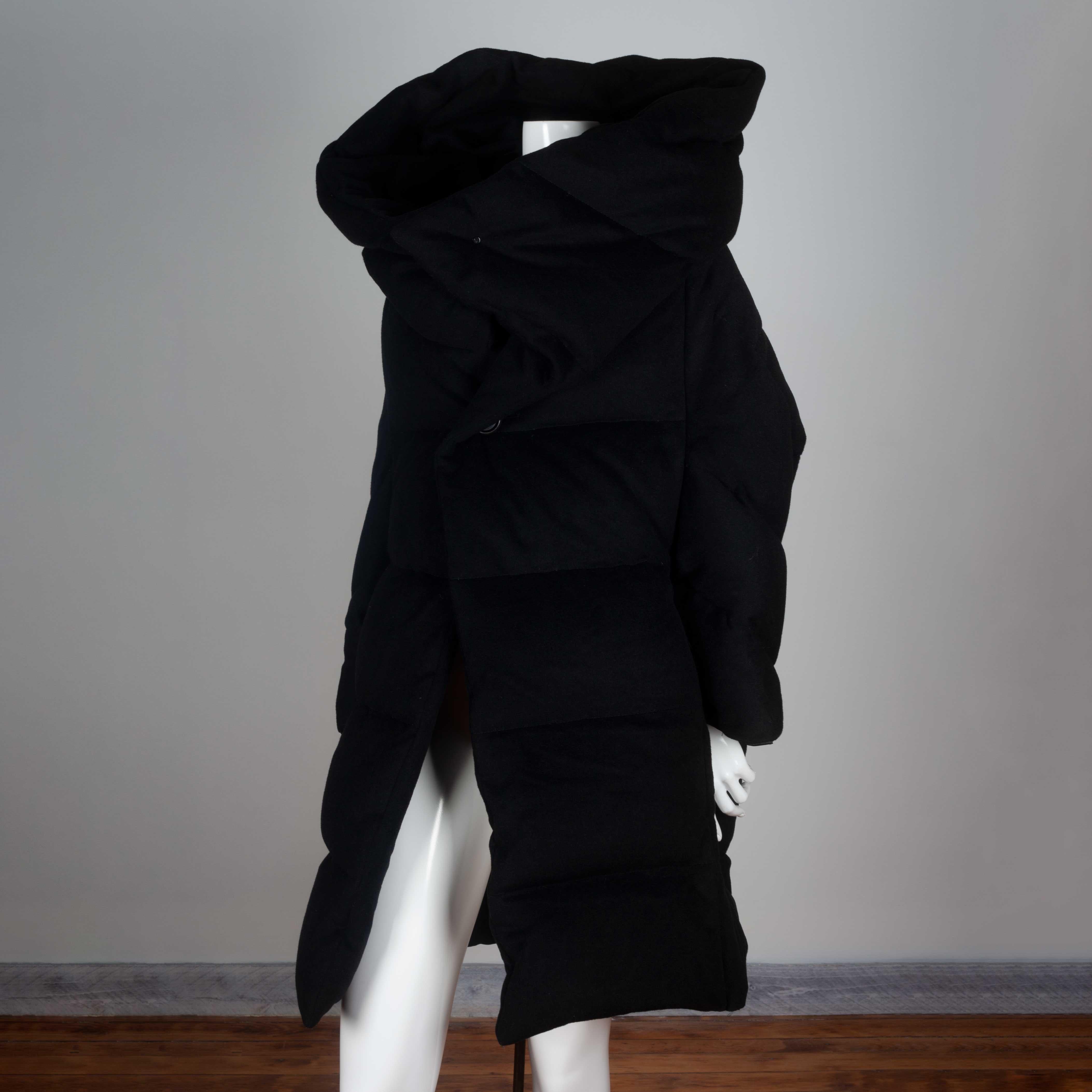 Junya Watanabe Comme des Garçons vintage archive 2004 warm winter coat from Japan in black cashmere, wool and down feather. Deconstructed style with large, dramatic collar that can be worn folded over the shoulders or up around the neck and head. A
