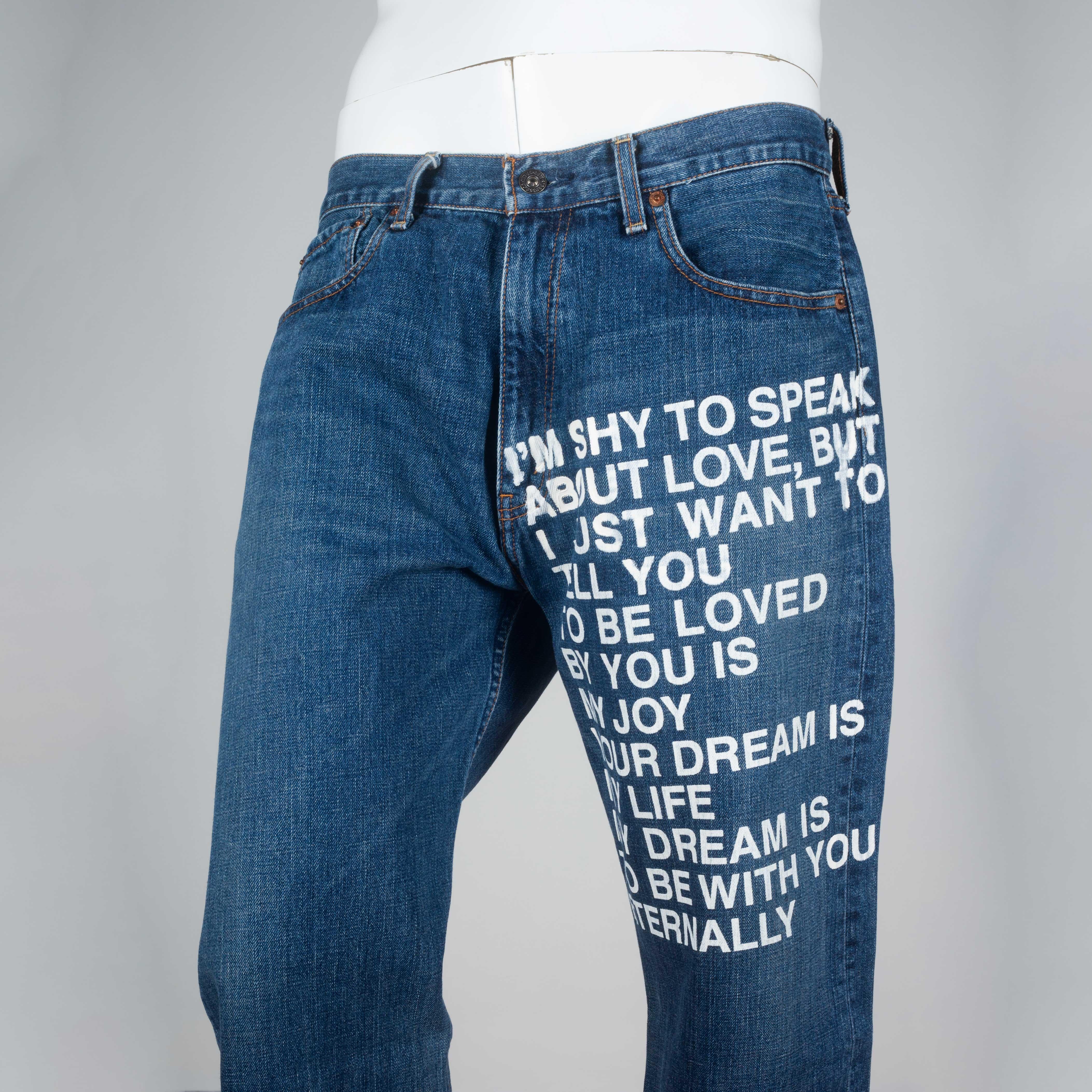 Junya Watanabe Comme des Garçons x Levi's vintage archive 2001 poem jeans from Japan. Watanabe excels in reinventing iconic classic like Levi's jeans, here with a poetic message. Medium wash, straight cut. Poem reads:

I'm shy to speak about