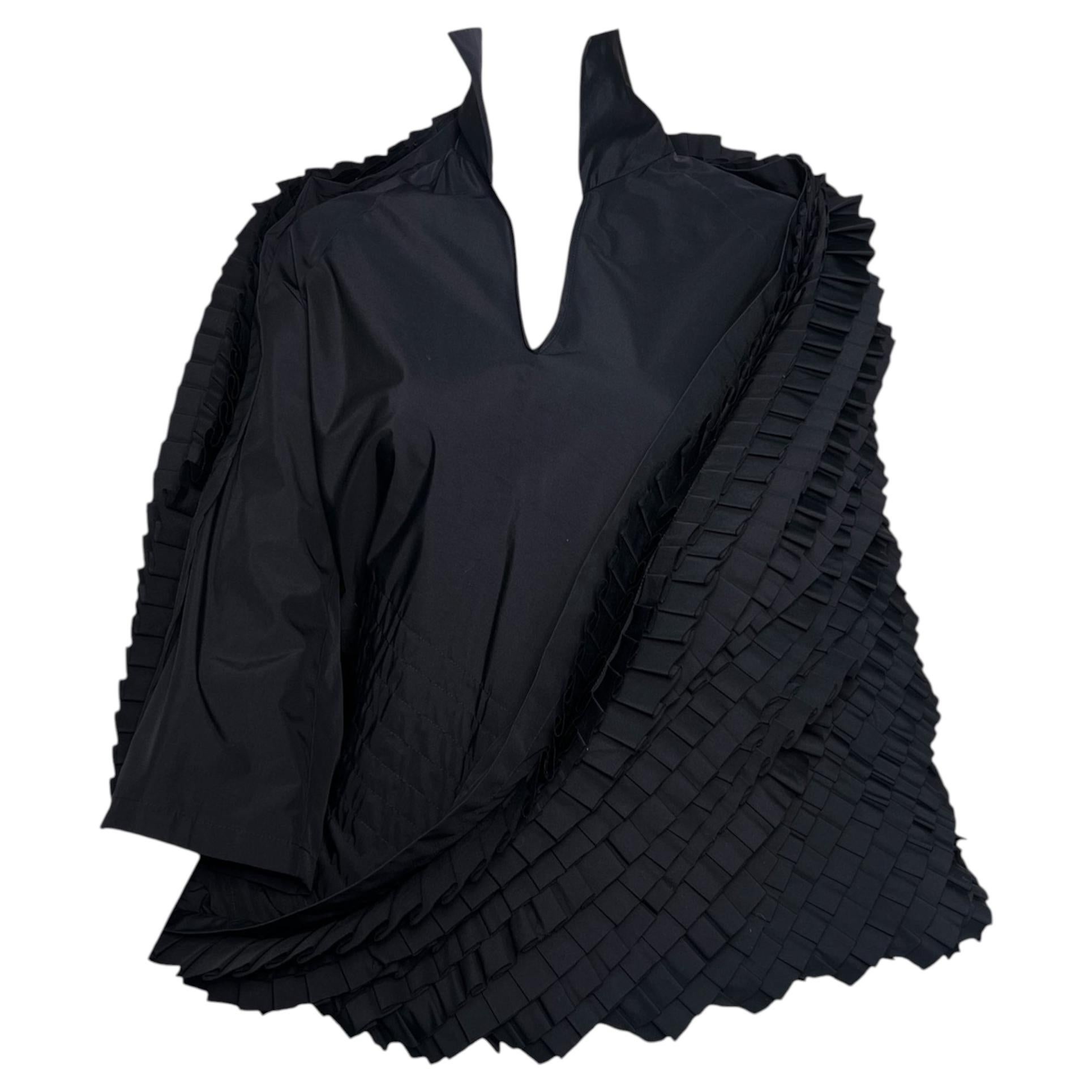 Túnica tipo capullo con volantes de tafetán negro de Junya Watanabe para Comme des Garçons, primavera de 2000