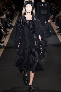 Blusa de malla con lentejuelas y patchwork negro de Junya Watanabe Comme des Garçons, otoño de 2014