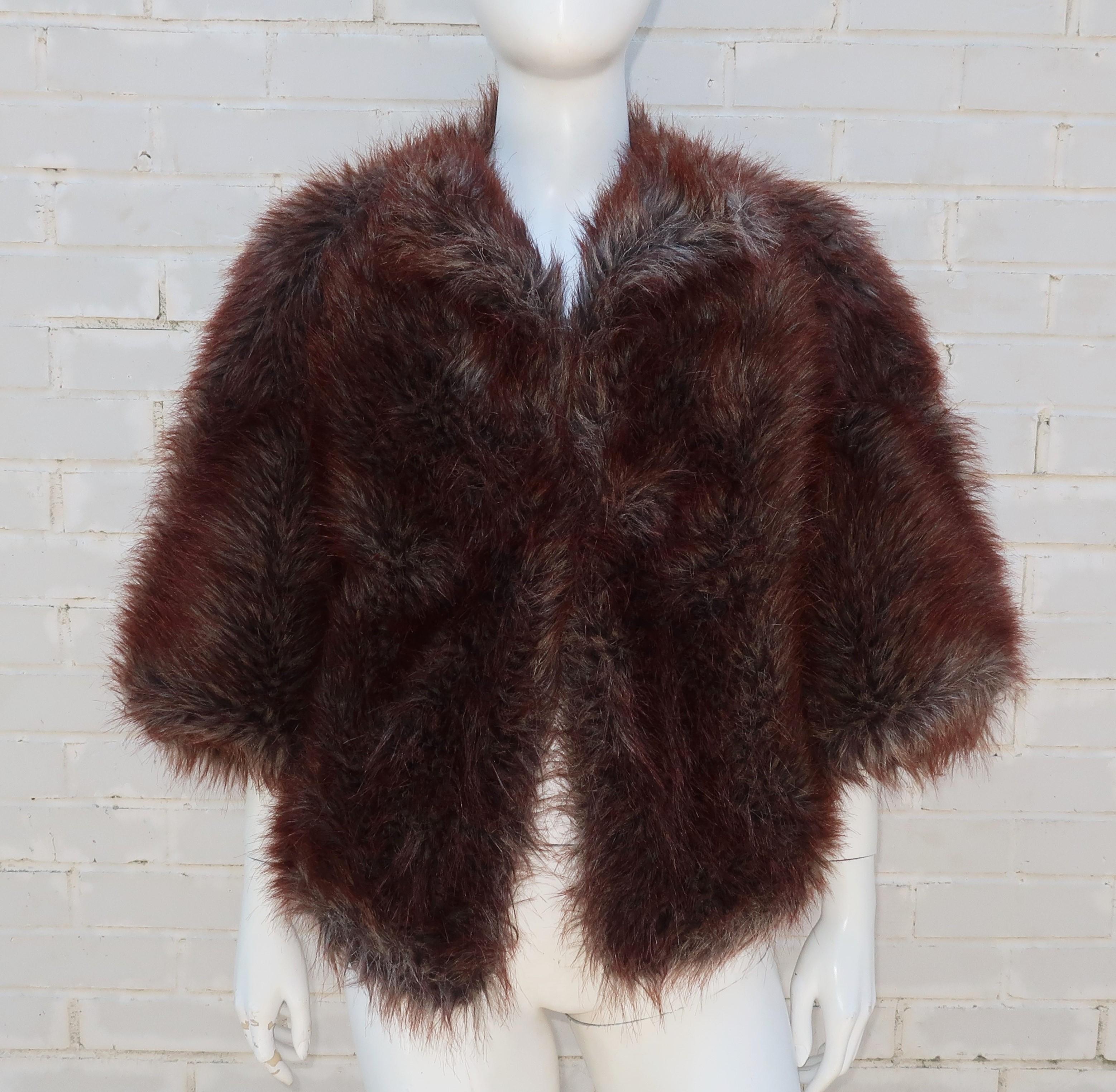 Junya Watanabe for Comme des Garcons 'faux fabulous' fur jacket with a cocoon style silhouette.  The chunky look is refined by angled cuffs and an elegant swing back emphasized by the color variations in the fur which includes a rich chestnut brown,