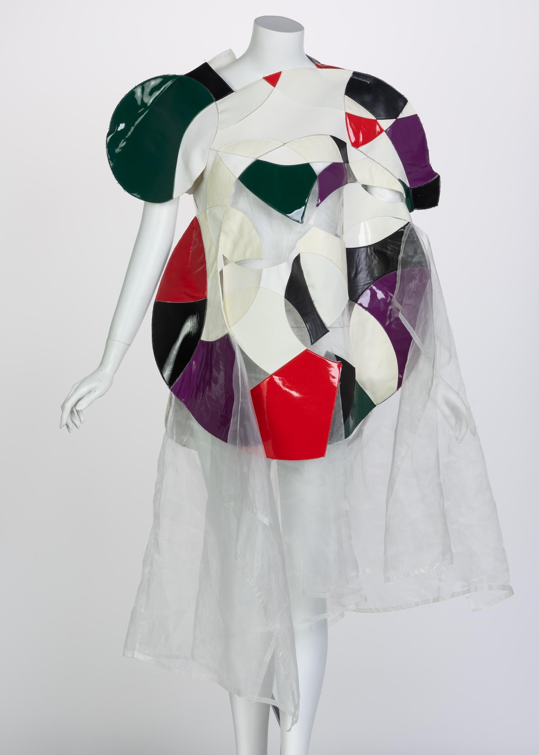 In true avant-garde form, Junya Watanabe’s Spring 2015 collection featured unexpected volumes, unconventional textiles, and bold color combinations. Paying homage to the orphic cubism style of artists and designers like Sonia Delaunay, Watanabe took