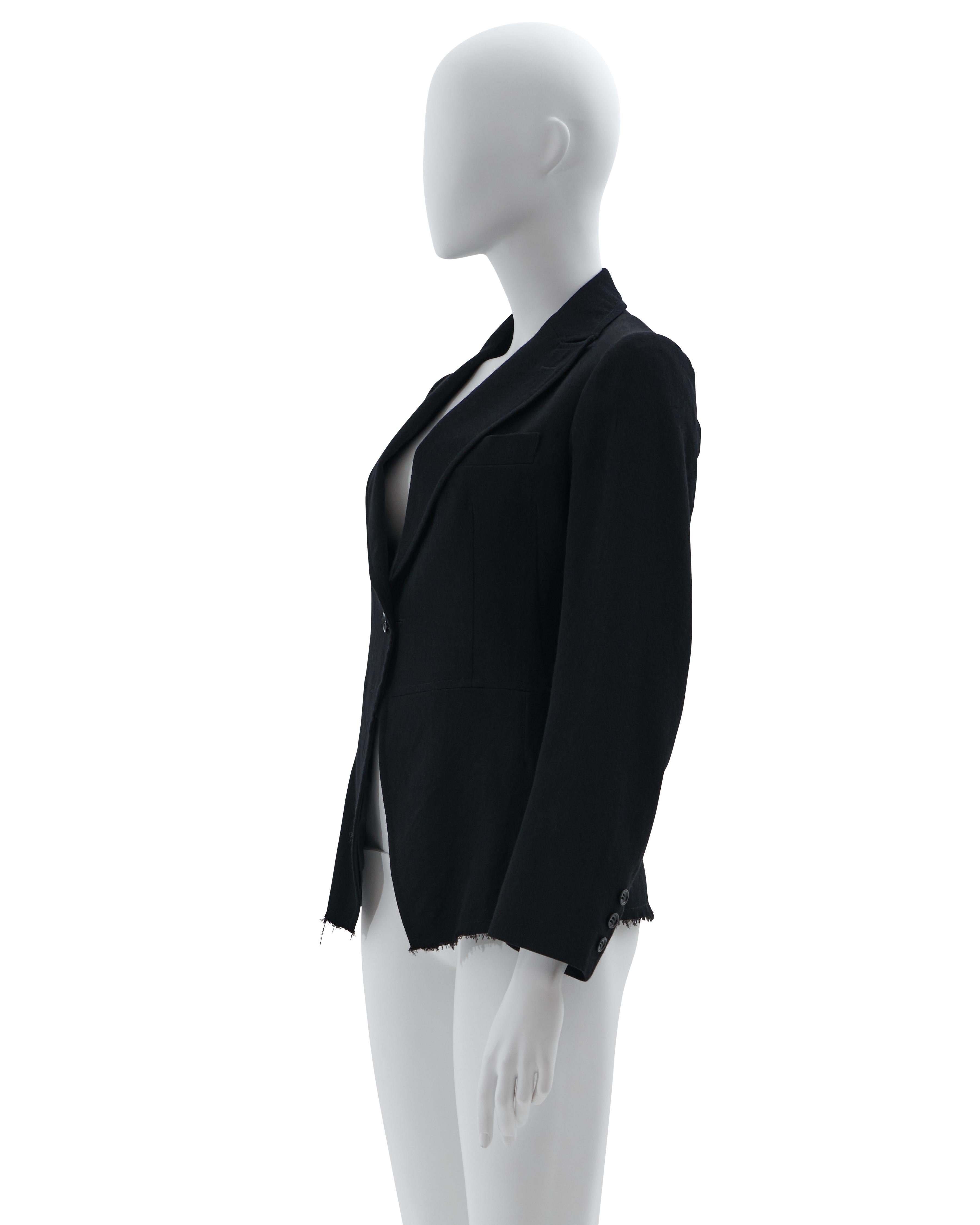 Junya Watanabe man pink label by Comme des Garçons
Black raw cut wool fitted jacket
Jacket cufflink button
Early 2000s
Made in Japan
Condition : Excellent, Wear consistent with age and use. Light wear from age and use throughout.
Composition : 100%