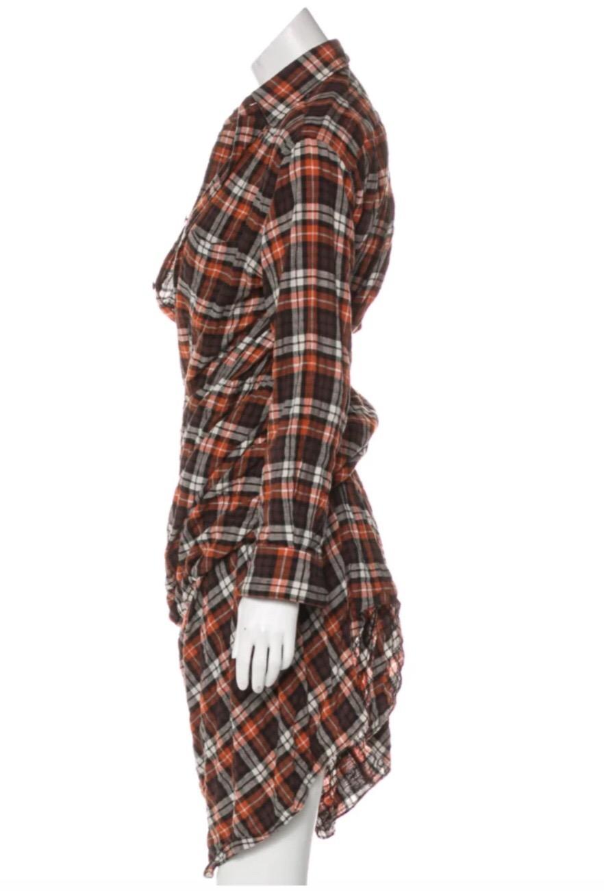 Junya Watanabe for Comme des Garcons orange, brown and white plaid long sleeve dress, single patch pocket at bust and button closures at front. Cotton blend.  Condition: Excellent.  Size XS

Bust: 33