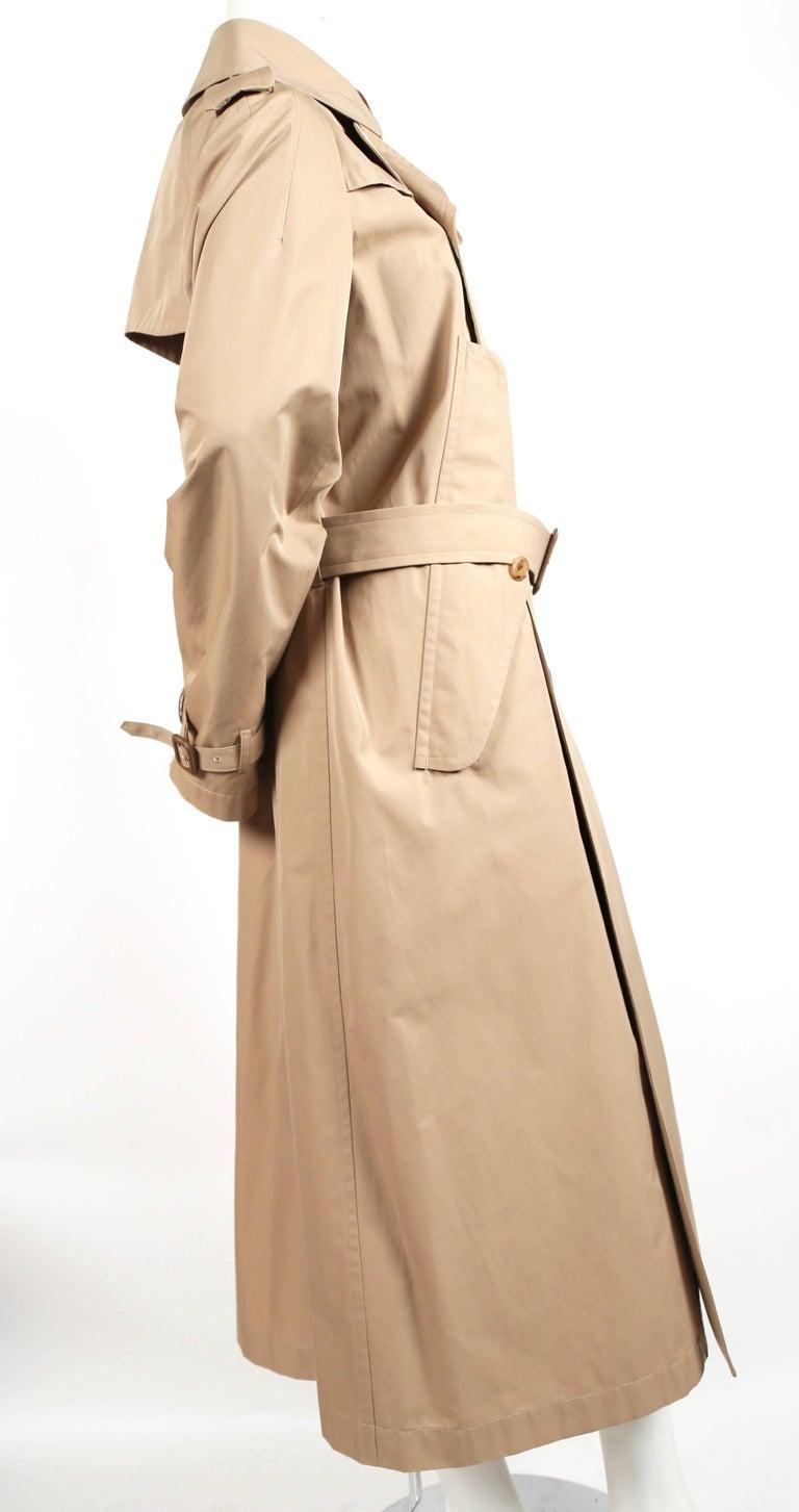 Tan trench coat designed by Junya Watanabe for Comme Des Garcons exactly as seen on the spring 2014 runway. Oversized fit. Size L however it works for many sizes and was not clipped on the size 2 mannequin. Approximate measurements: bust 42