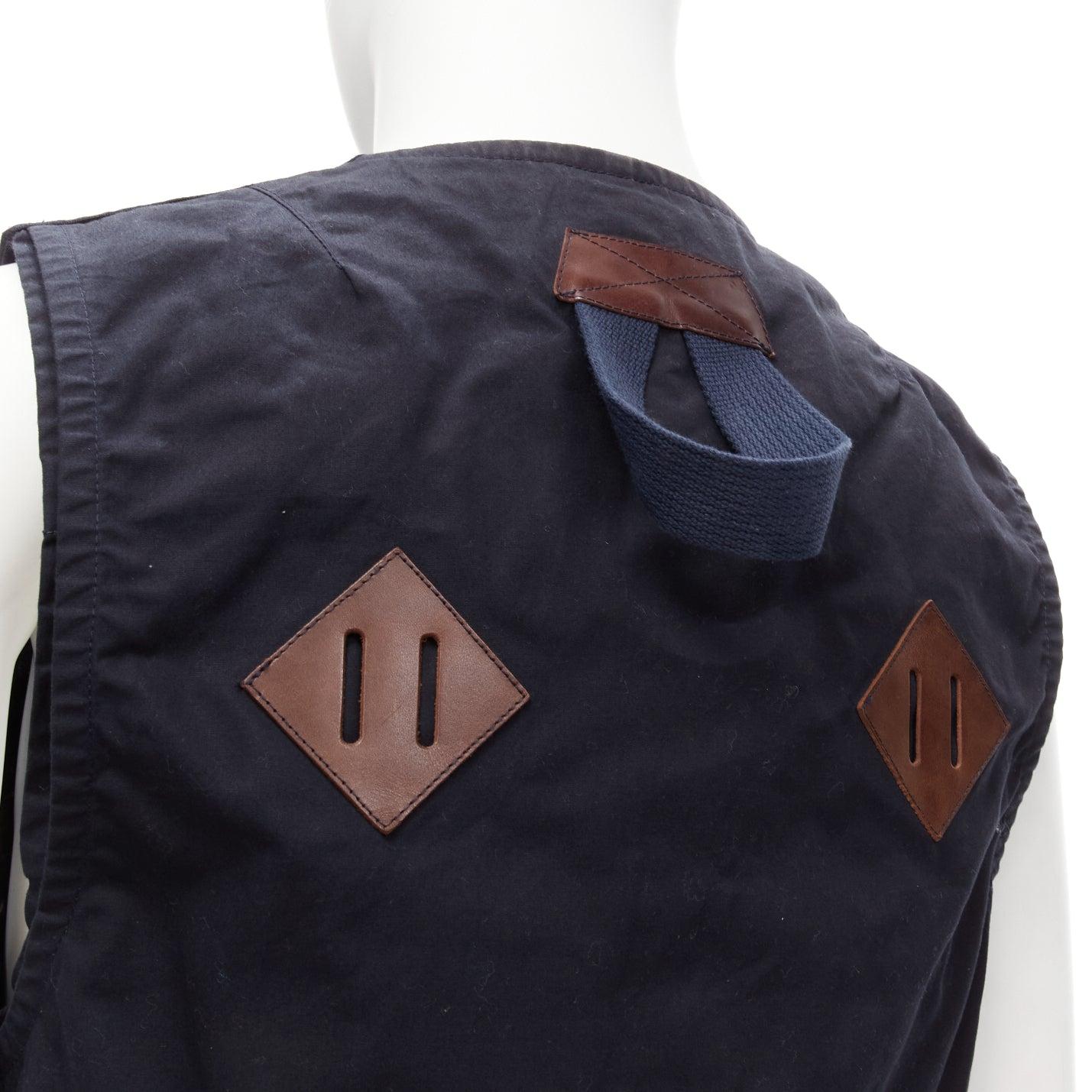 JUNYA WATANABE MAN HERVIER 2013 Reversible navy brown suede trim fisherman vest M
Reference: JSLE/A00030
Brand: Junya Watanabe
Collection: MAN HERVIER 2013
Material: Cotton, Leather
Color: Black, Brown
Pattern: Solid
Closure: Button
Lining: Black