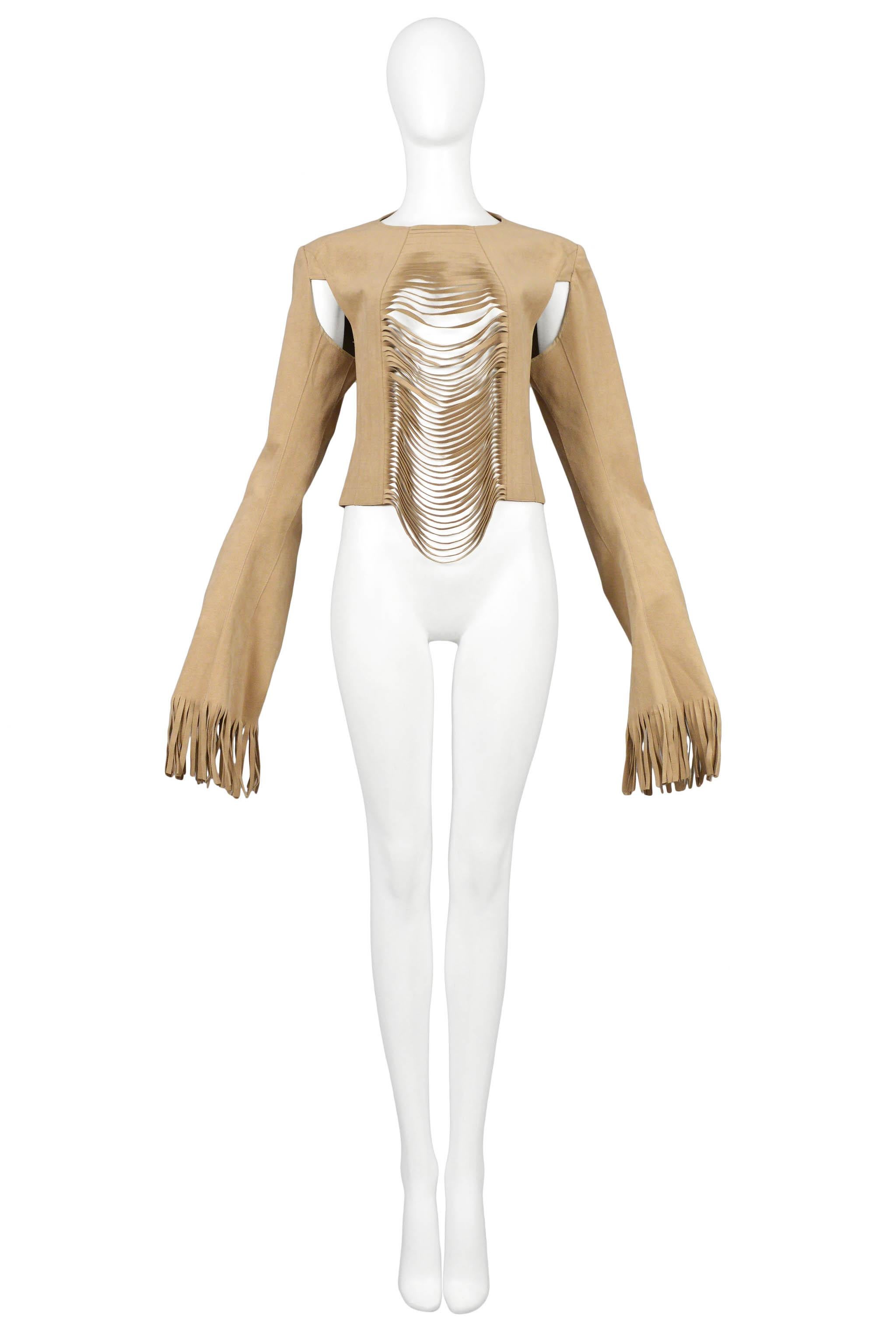 Resurrection Vintage is excited to offer a vintage Junya Watanabe beige faux suede new hippie top featuring cutout armholes, extra long sleeves, slash front panel, fringe cuffs, and exposed zipper back. 

Junya Watanabe
Size: Medium
Faux Suede
Circa