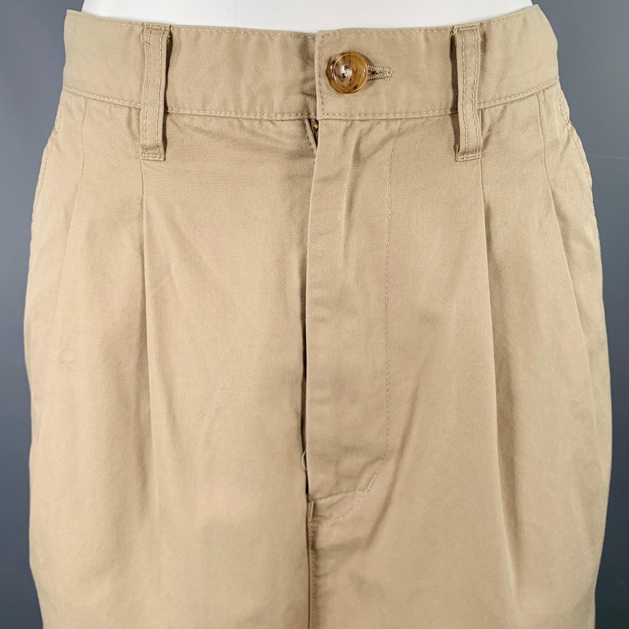 JUNYA WATANABE casual pants
in a khaki cotton twill featuring a pleated style, drop crotch, and zip fly closure. Made in Japan.Excellent Pre-Owned Condition. 

Marked:   S 

Measurements: 
  Waist: 29 inches Rise: 15.5 inches Inseam: 18 inches 
  
 