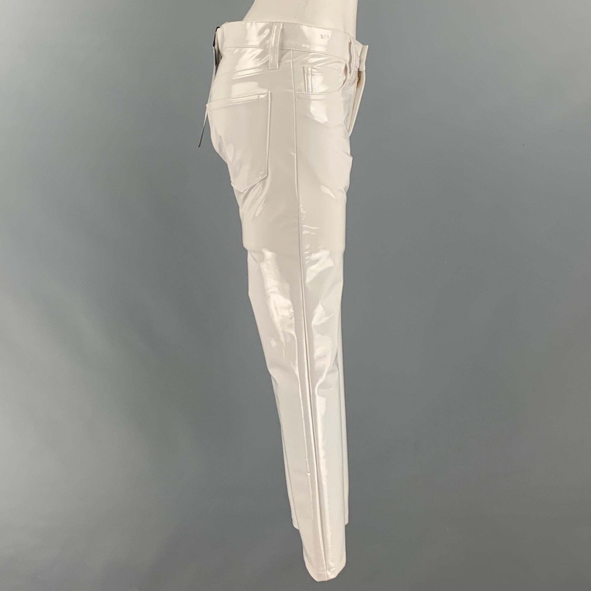 JUNYA WATANABE Comme des Garcons AD 2019 pants comes in a white polyester leather like material featuring a straight leg, jean cut with five pockets, and a zipper fly closure. Made in Japan.New with Tags. 

Marked:   S 

Measurements: 
  Waist: 31