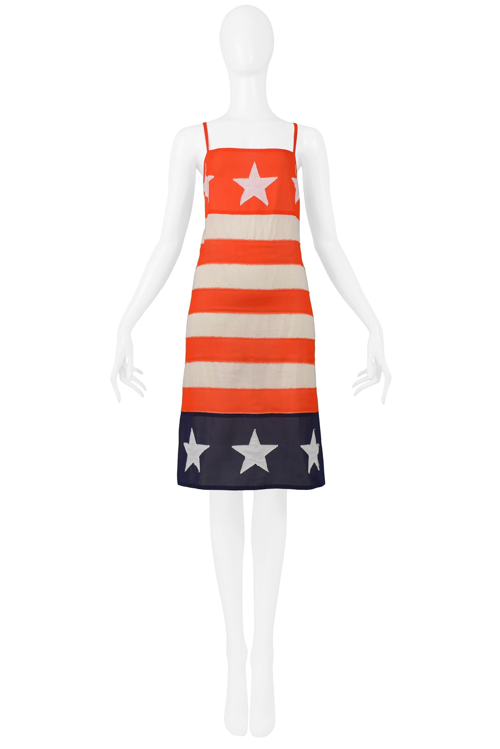 Resurrection Vintage is excited to offer a vintage Junya Watanabe for Comme des Garcons red, white, and blue cotton stars and stripes slip dress featuring skinny straps, square neckline, side zipper, and a-line body. 

Junya Watanabe
Size: Medium