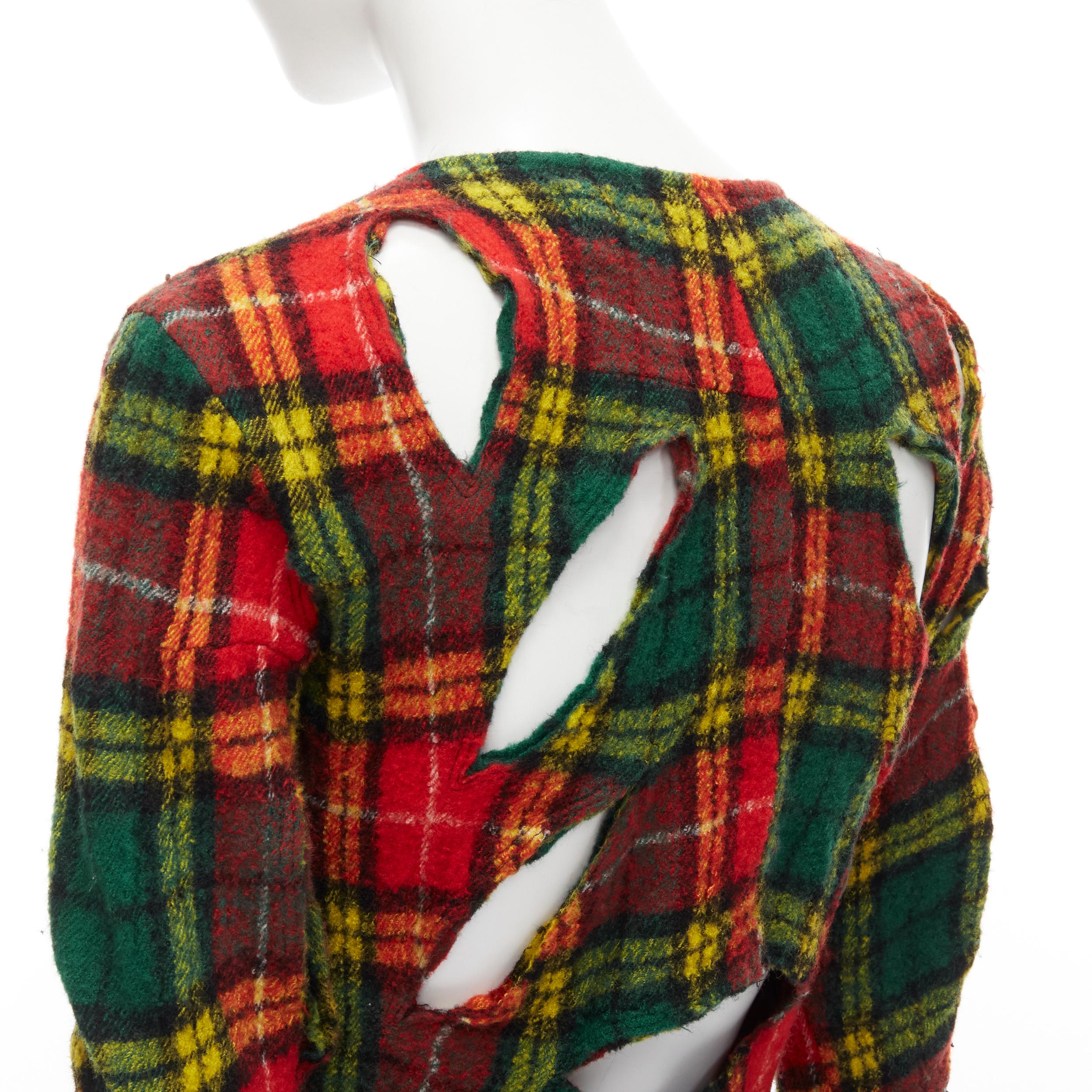 JUNYA WATANABE Vintage 1995 red punk plaid boiled wool slash cut out jacket S 
Reference: CRTI/A00570 
Brand: Junya Watanabe 
Collection: 1995 
Material: Wool 
Color: Red 
Pattern: Check 
Closure: Zip 
Extra Detail: Slashed cut out design