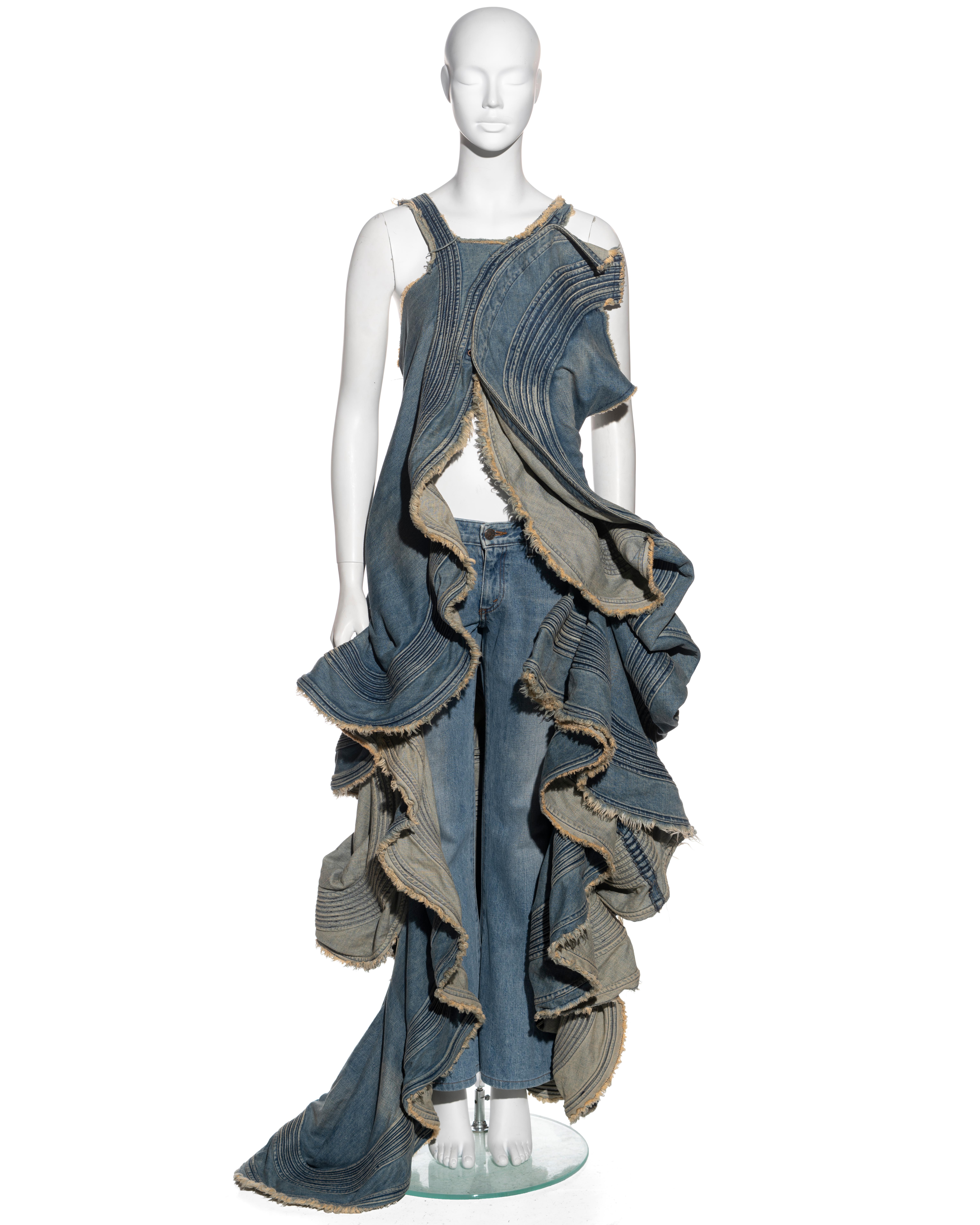 ▪ Junya Watanabe dress and pants ensemble
▪ Sold by One of a Kind Archive
▪ Museum piece
▪ Constructed from Japanese washed denim 
▪ Deconstructed dress with multiple curved panels 
▪ Heavyweight 
▪ Corset hooks at the front opening 
▪ Floor-length