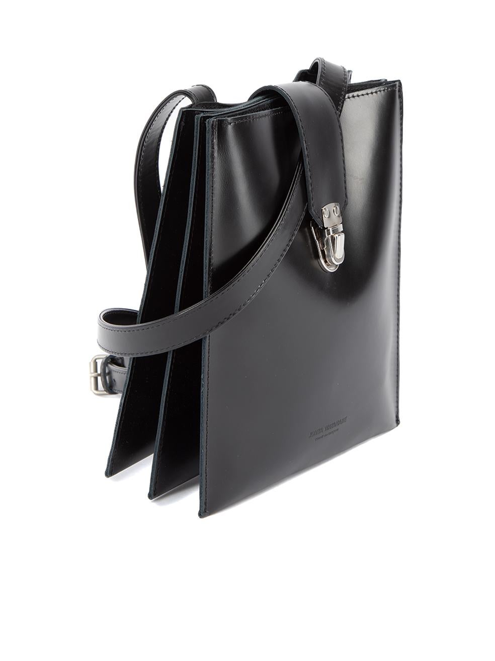 CONDITION is Very good. Hardly any visible wear to bag is evident on this used Junya Watanabe designer resale item. 
 
 Details
  Black
 Leather
 Mini envelope crossbody bag
 Accordion sides
 1x Buckle adjustable shoulder strap
 Press lock closure
