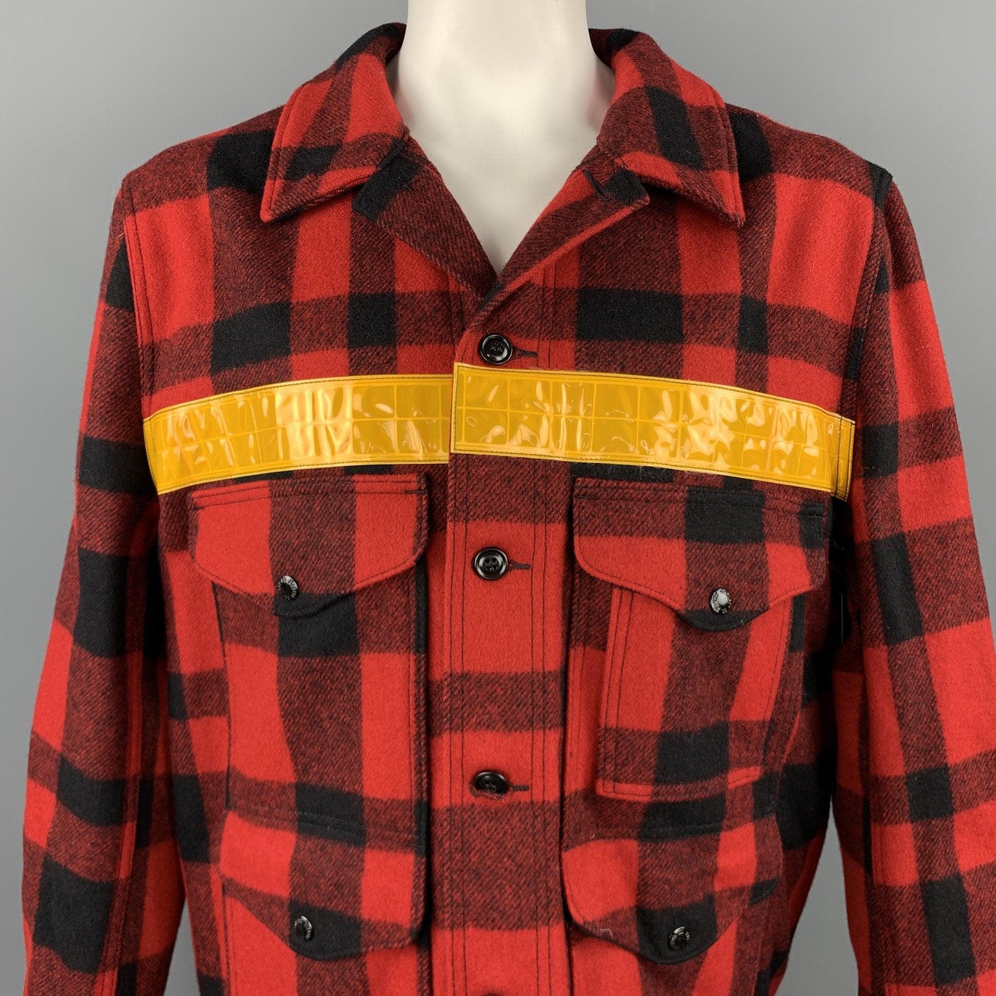 JUNYA WATANABE MAN x FILSON jacket comes in a red & black buffalo plaid wool with a yellow reflective stripe detail featuring front patch pockets, leather elbow patches, nylon back, and a buttoned closure. 
Made in Japan / USA.Excellent
Pre-Owned