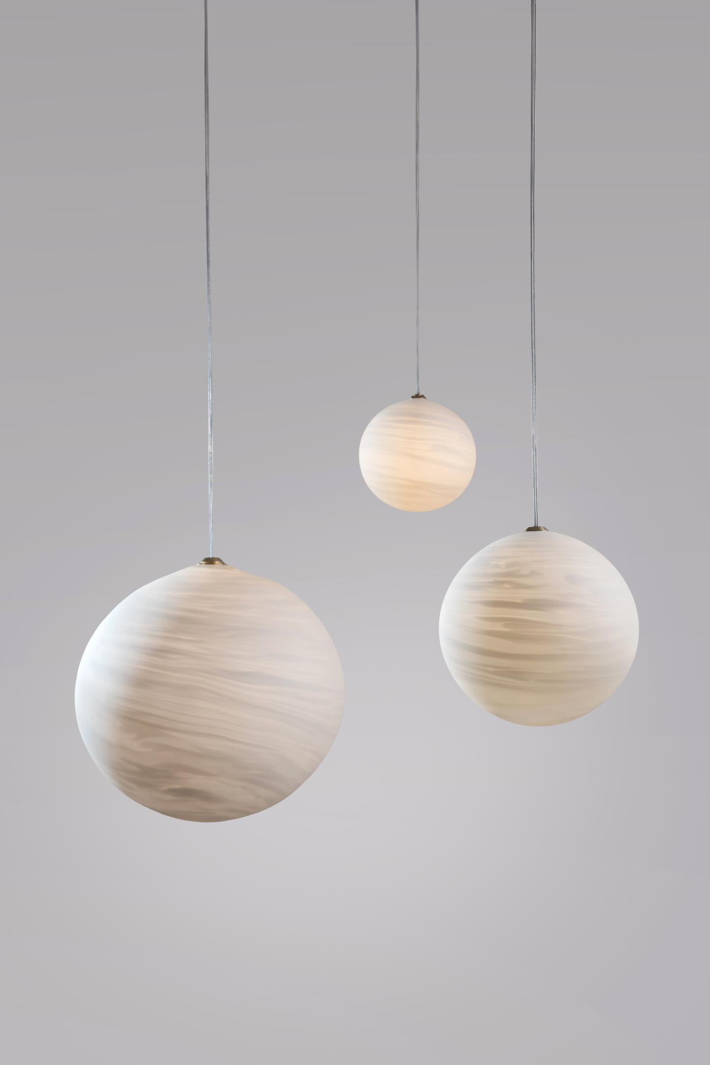 Jupiter hanging lights planets, Ludovic Clément d’Armont
Every creation of Ludovic Clément d’Armont can be made to order in any requested dimensions. 
Blown glass
Dimensions of the planets can vary in the following dimensions: 10 cm, 14 cm, 18