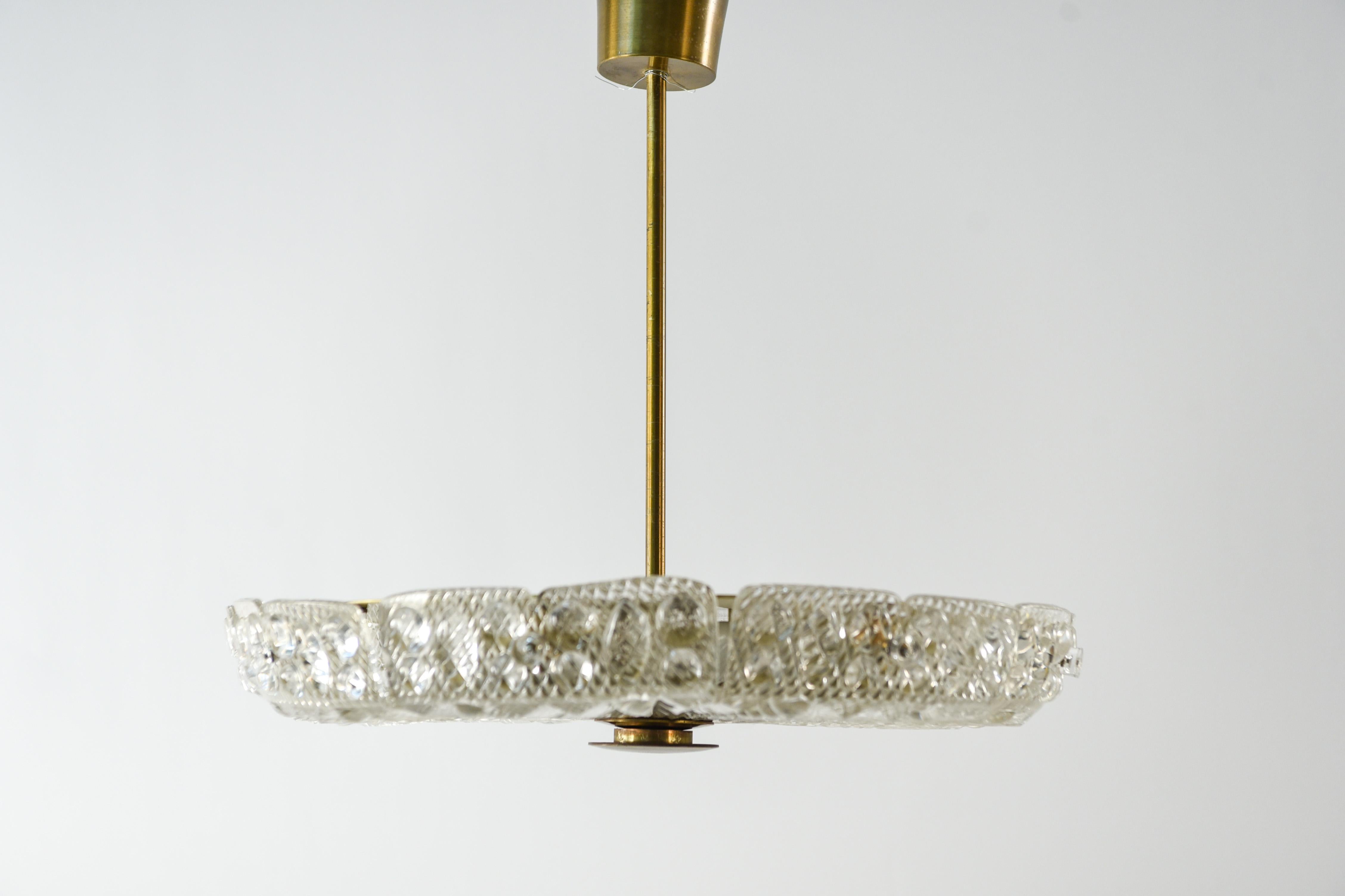 This Swedish midcentury pendant chandelier is model 