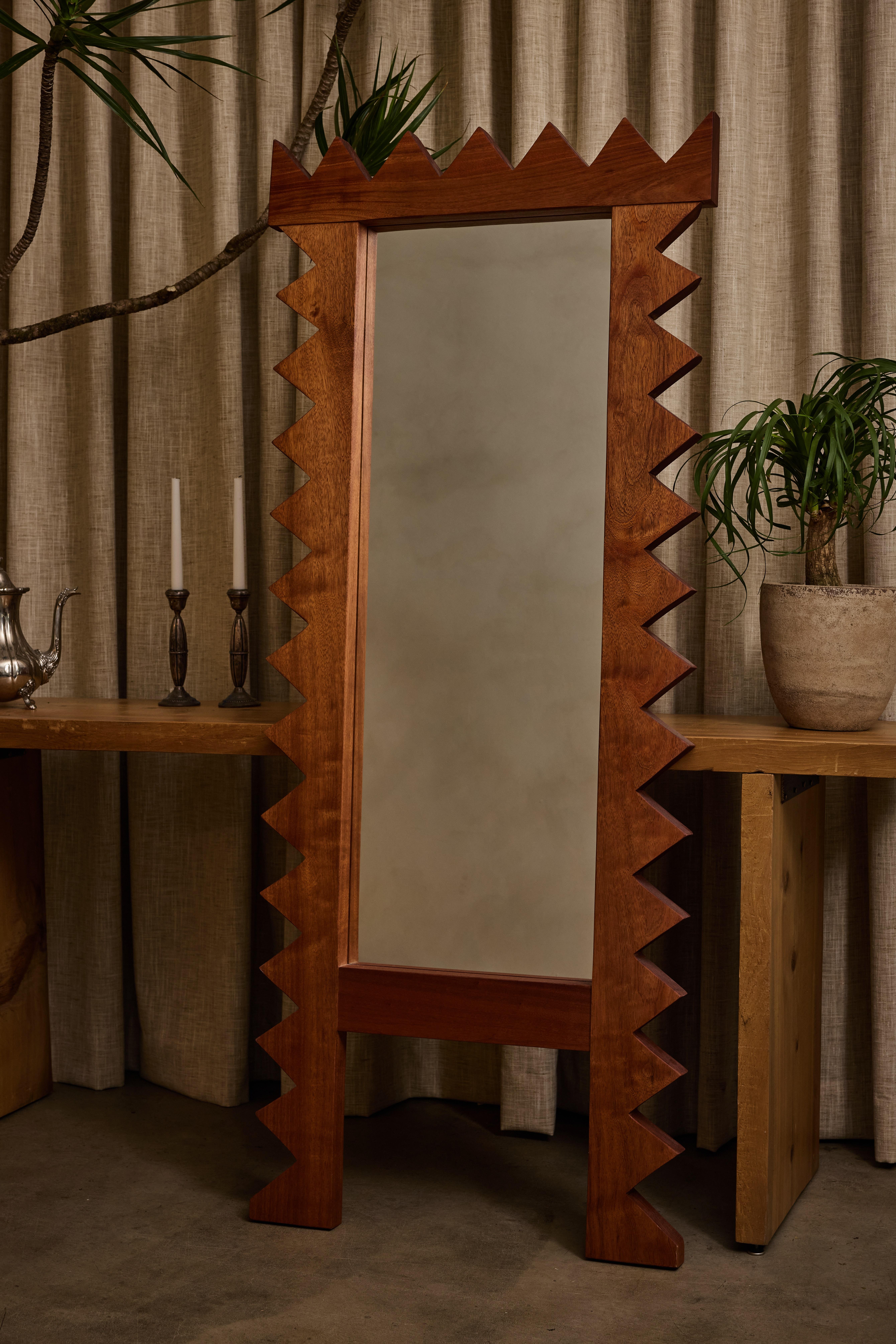 Jura Mirror by Ah Um Design Studio
Handmade
Dimensions: D 5 x W 91.4 x H 185.4 cm.
Materials: Mahogany wood, glass.

Available in other finish options. Please contact us.

A bold and distinctive statement mirror, expertly carved from solid mahogany.