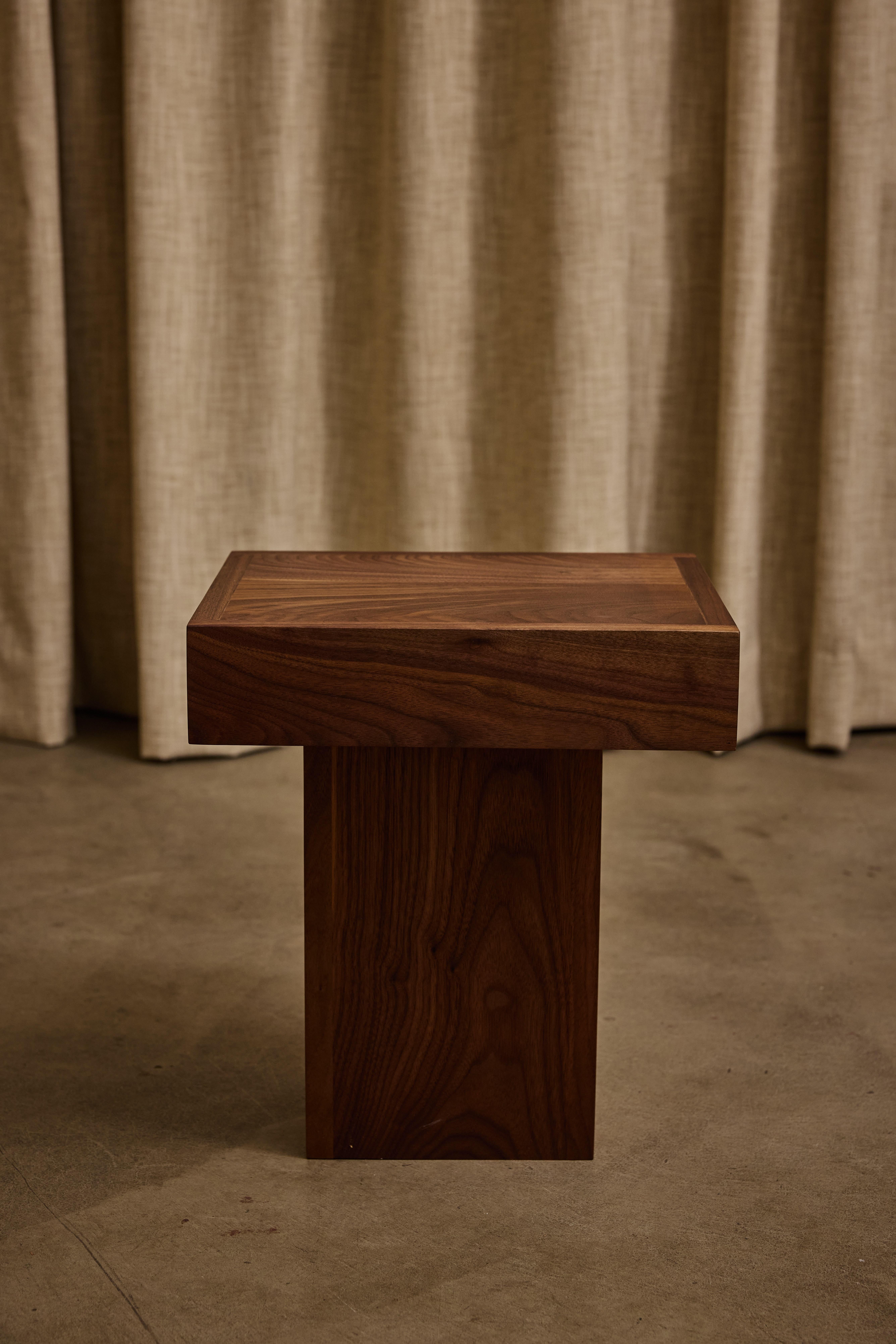 Jura Pedestal by Ah Um Design Studio
Handmade
Dimensions: D 29.2 x W 33 x H 38.1 cm.
Materials: Walnut wood, oil finish.

Available in other finish options. Please contact us.

This elegant pedestal is handcrafted from rich walnut wood, featuring a
