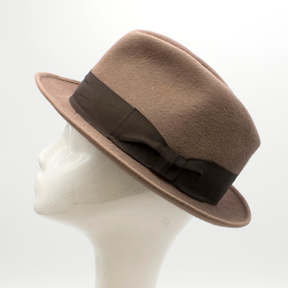 Juretic Maria Gorizia Brown Rabbit Felt Fedora Hat

- This timeless styled fedora hat has stood the test of time, with its classic firm brimmed hat, with a dark brown strap around the head of the hat.
- Has leather and silk material inside the hat